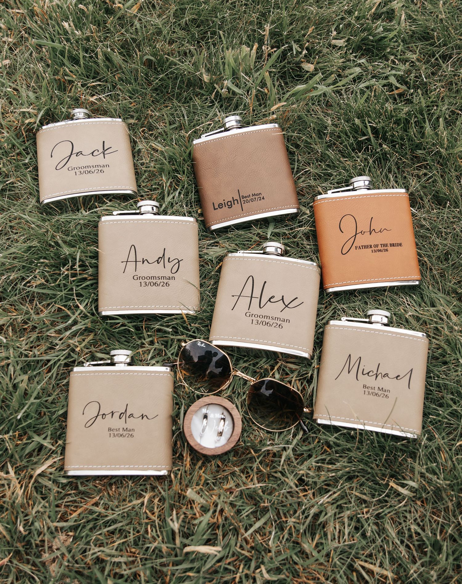 Personalized leather hip flasks with names like Jack, Andy, Alex, Jordan, and Michael, perfect for groomsmen wedding gifts.