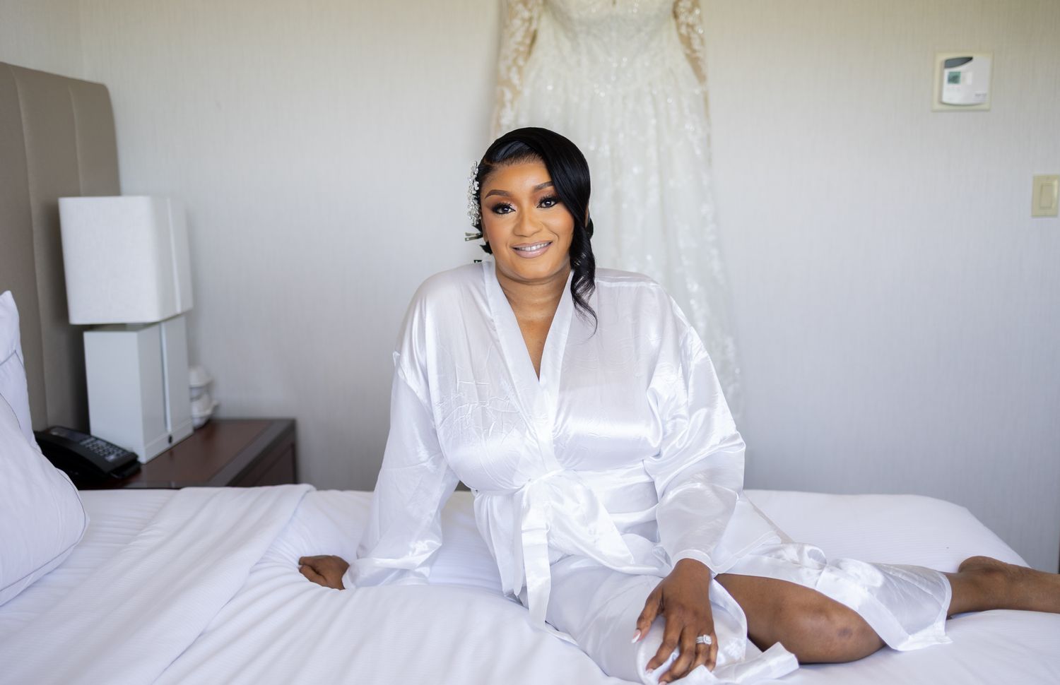 A collage of five photos showing a person in a white robe relaxing on a white bed in a hotel room.