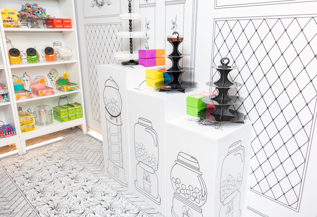 A collection of black and white line drawings showing various interior scenes and decorative patterns arranged in a row.