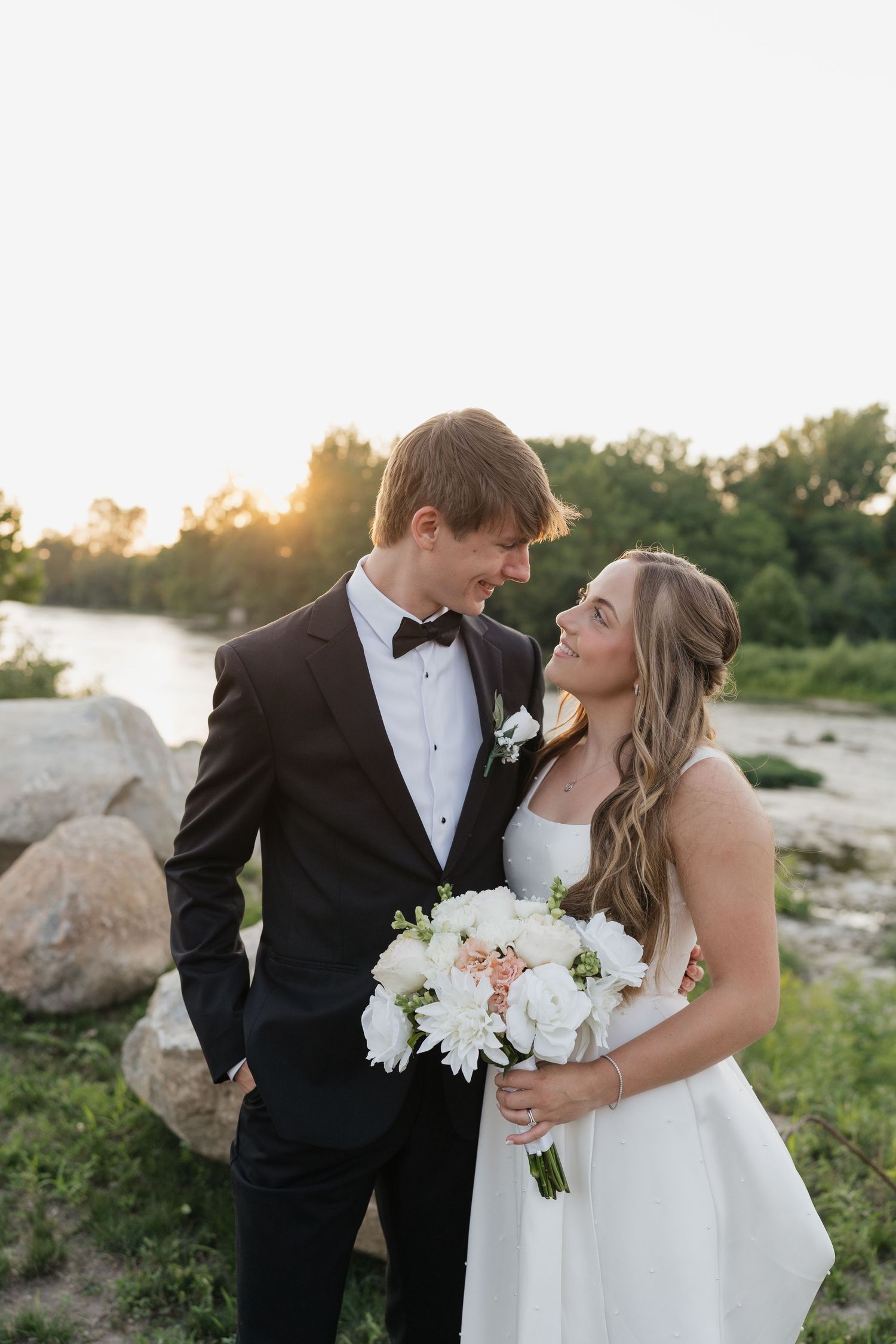 Wedding photographer in Delphi, Indiana capturing bride and groom sunset photos at The Vibrant, Logansport Indiana