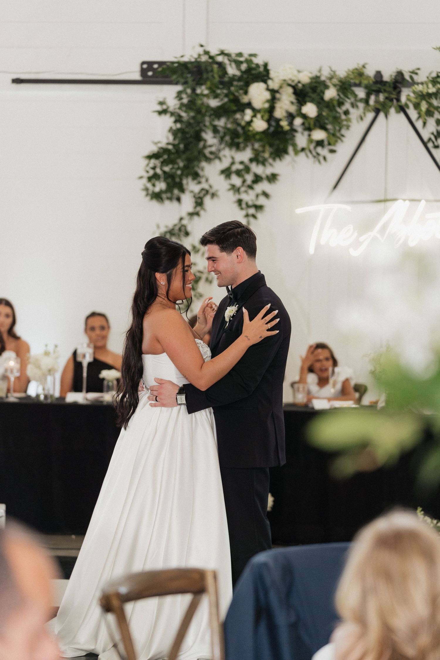 Wedding photographer in Delphi, Indiana capturing wedding reception moments at Sixpence in Whitestown, IN
