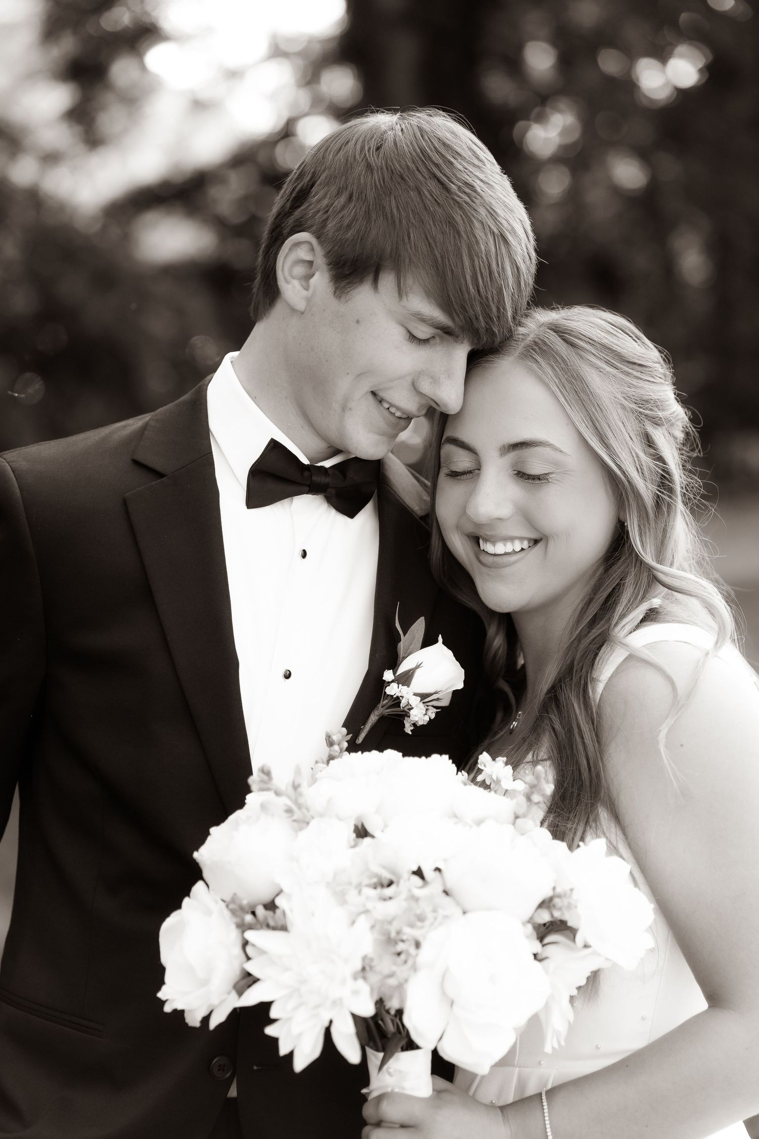 Wedding photographer in Delphi, Indiana capturing bride and groom sunset photos at The Vibrant, Logansport Indiana