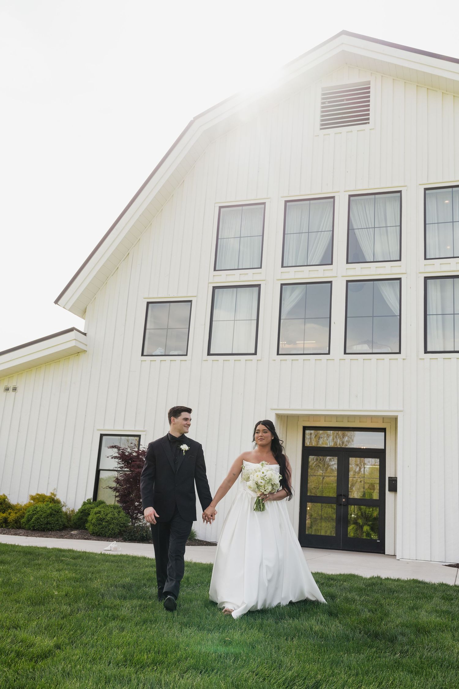 Wedding photographer in Delphi, Indiana capturing bride and groom moments at Sixpence in Whitestown, IN