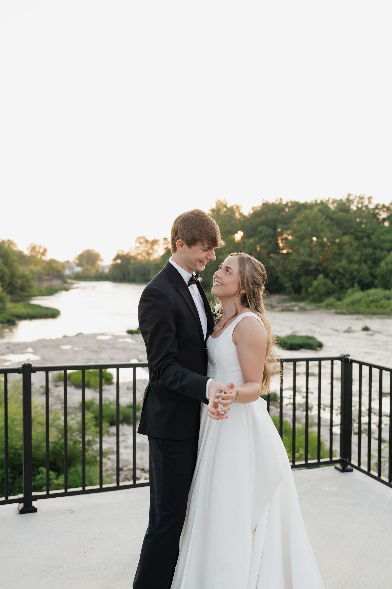Wedding photographer in Delphi, Indiana capturing bride and groom sunset photos at The Vibrant, Logansport Indiana