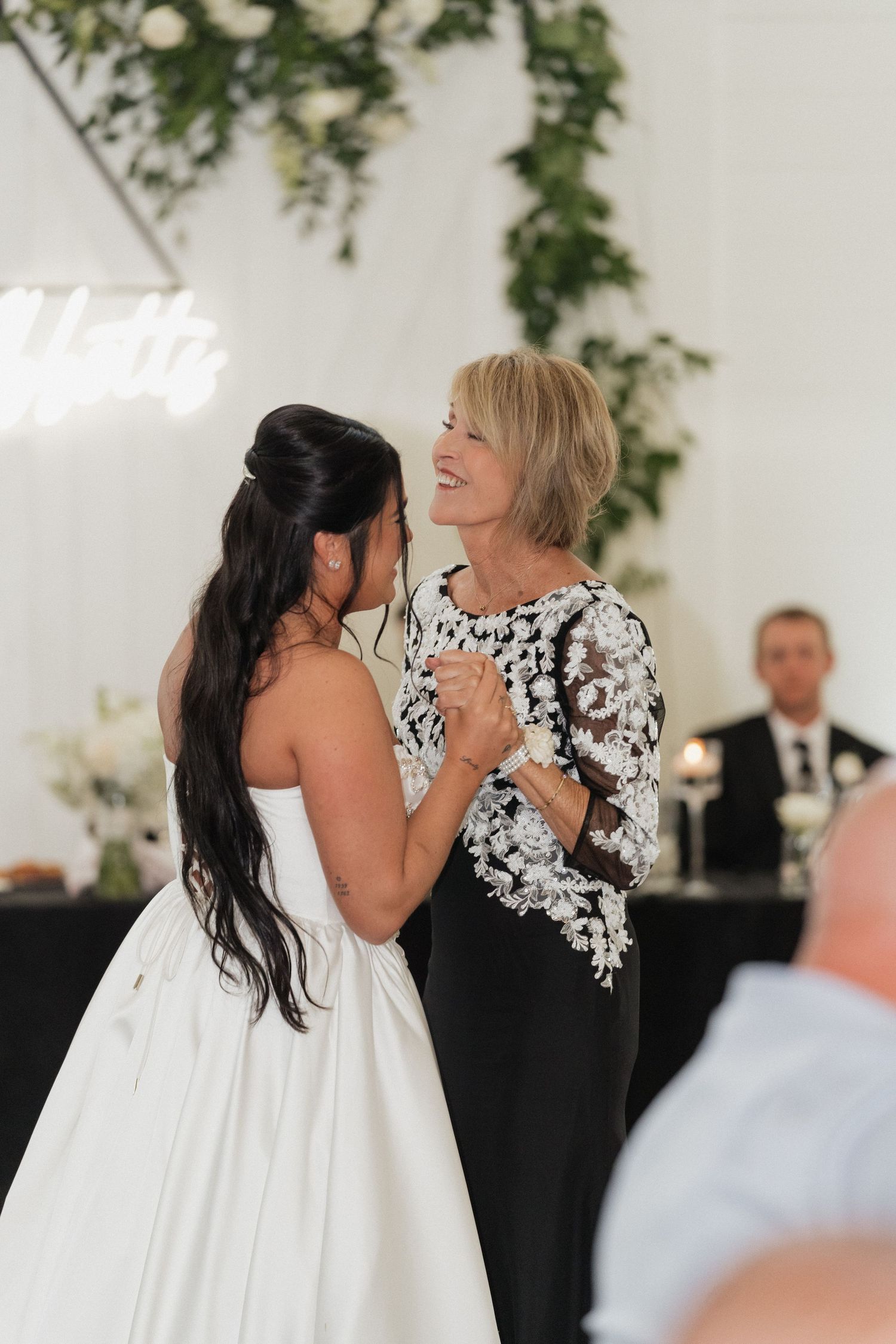 Wedding photographer in Delphi, Indiana capturing wedding reception moments at Sixpence in Whitestown, IN