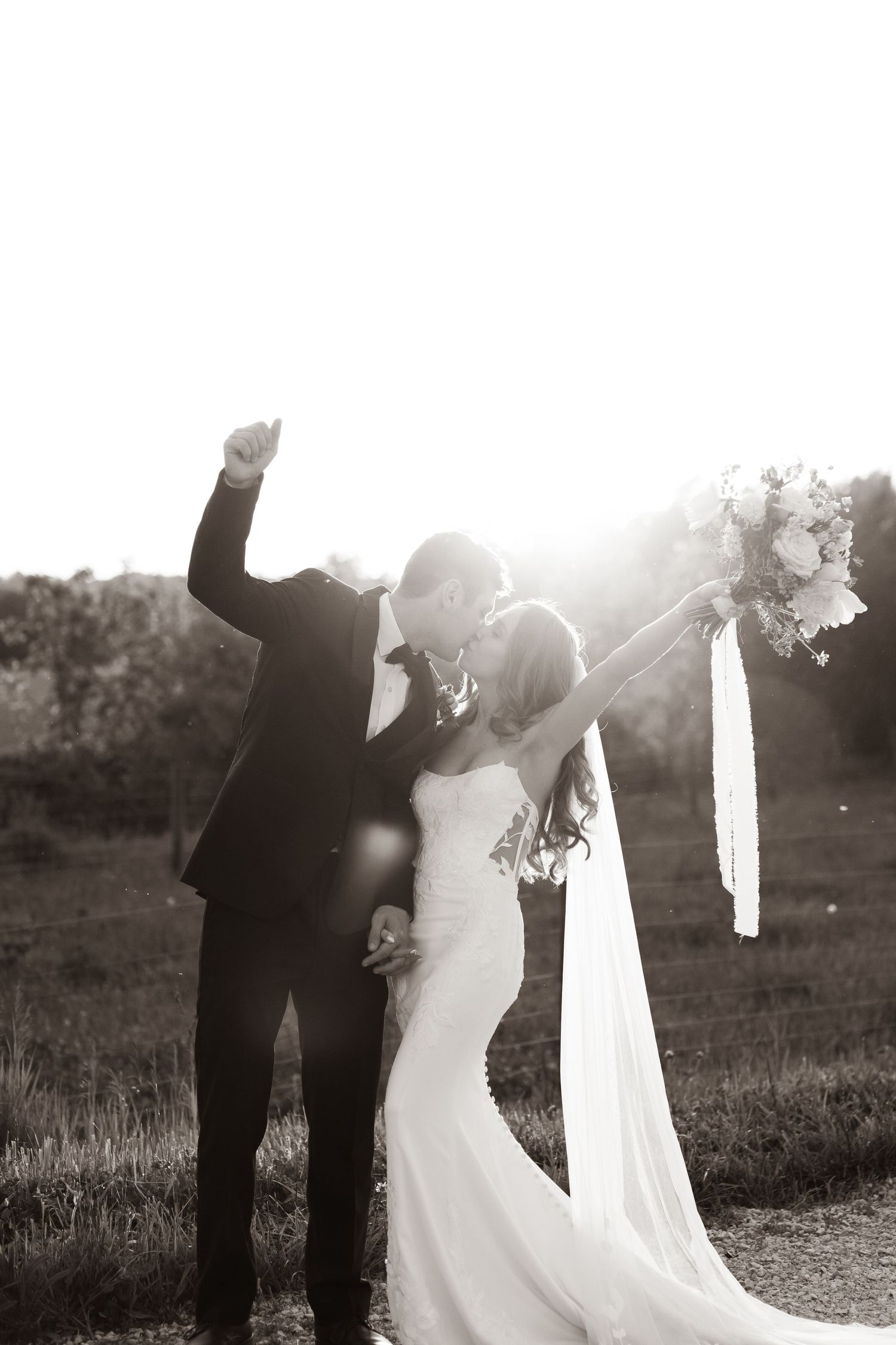 Wedding photographer in Delphi, Indiana capturing bride and groom moments at 3 Fat Labs Wedding & Event Barn in Greencastle, IN