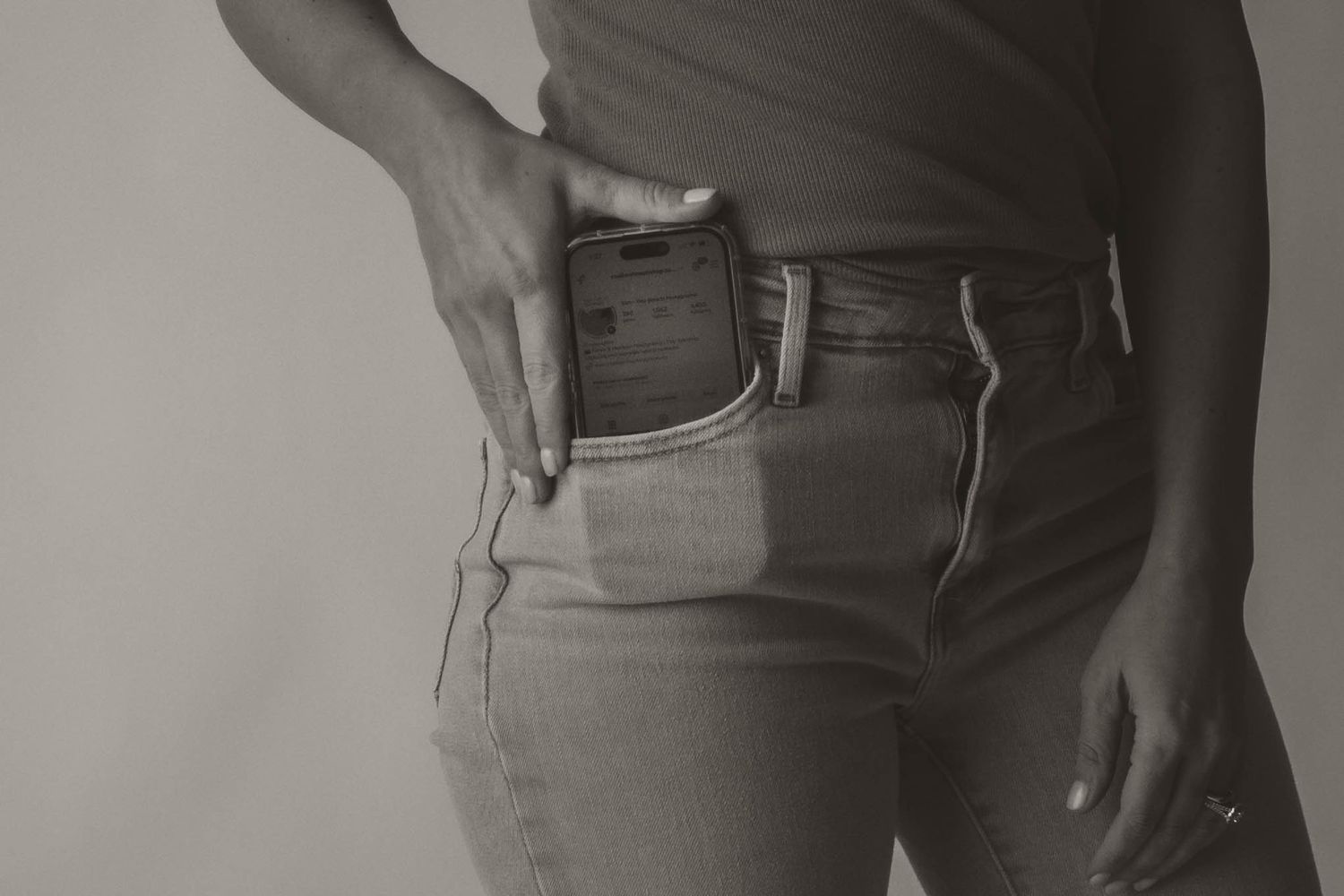 A person wearing blue jeans and a white t-shirt poses against a dark background in multiple cropped views.