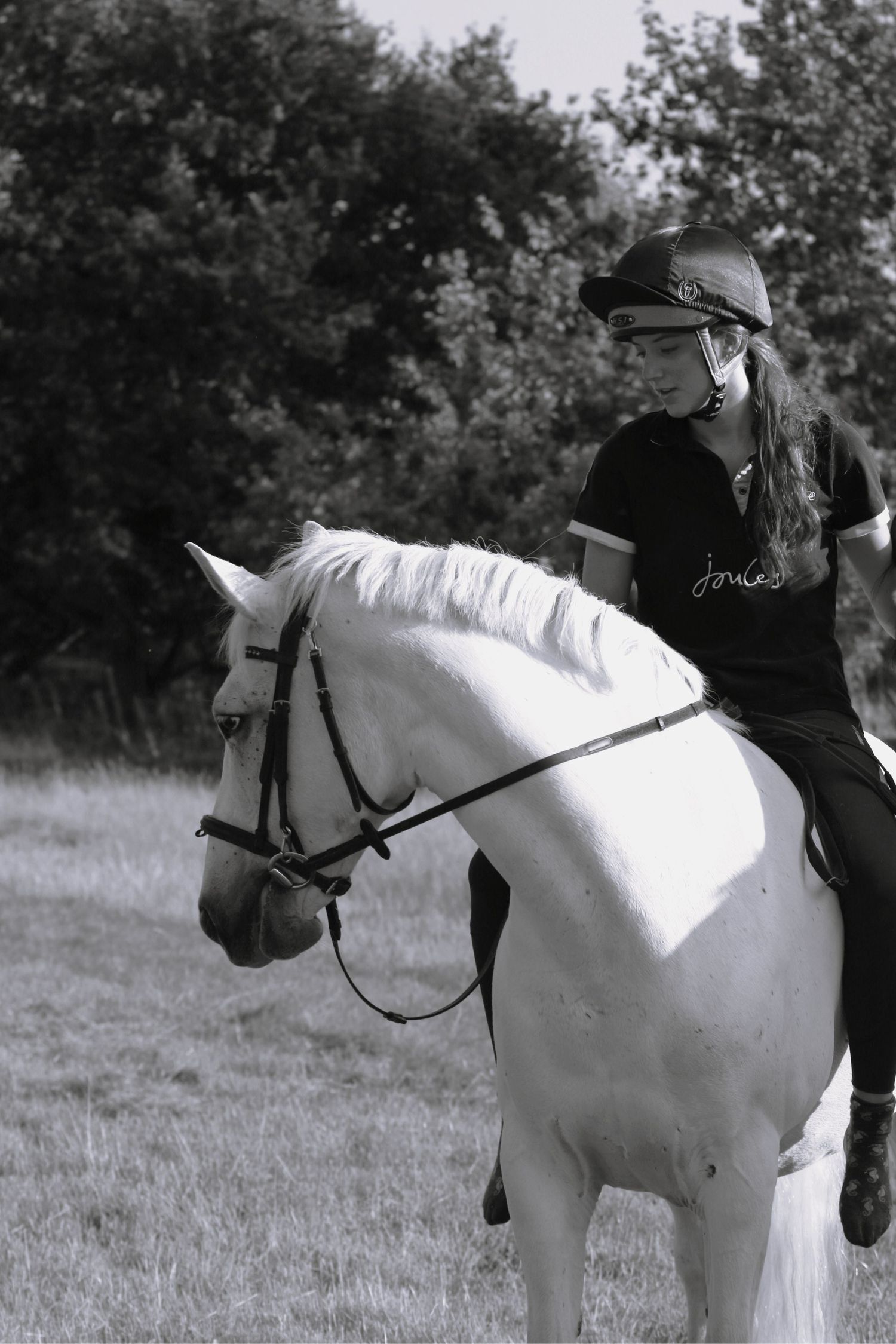 Black and white, horse and rider portraiture photography