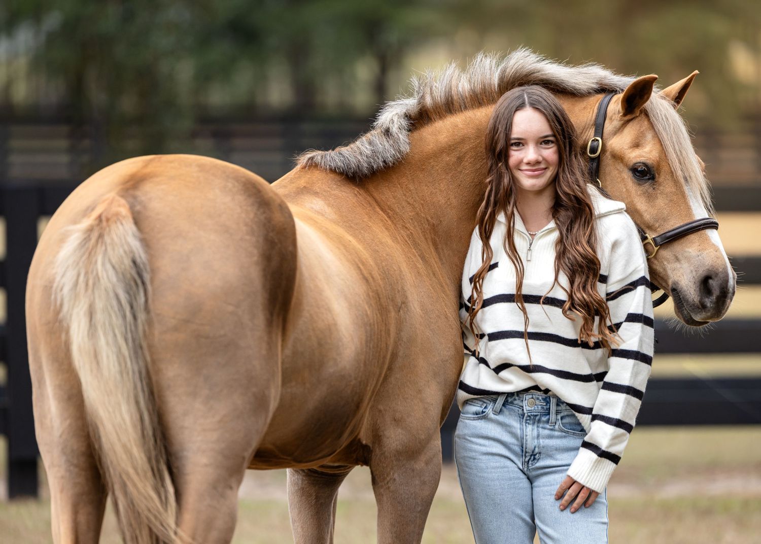 Young equestrian and her gelding posed during a portrait session in Alachua FL. Keli Wakeley/Keli Wakeley Photography