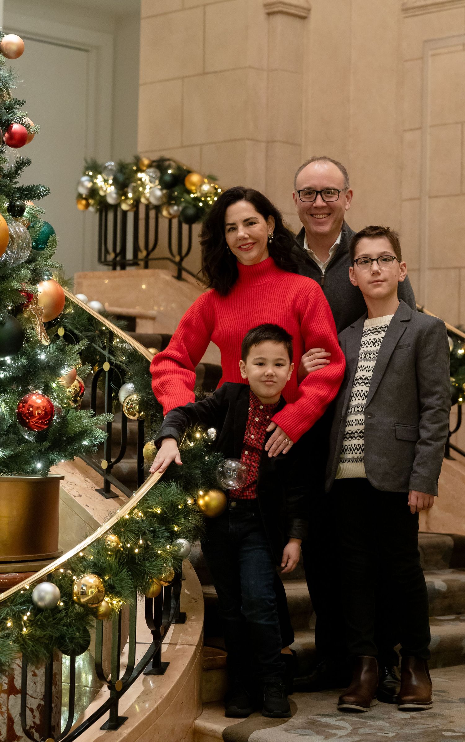 Elegant family portrait in New York City — classy and timeless look with urban sophistication.