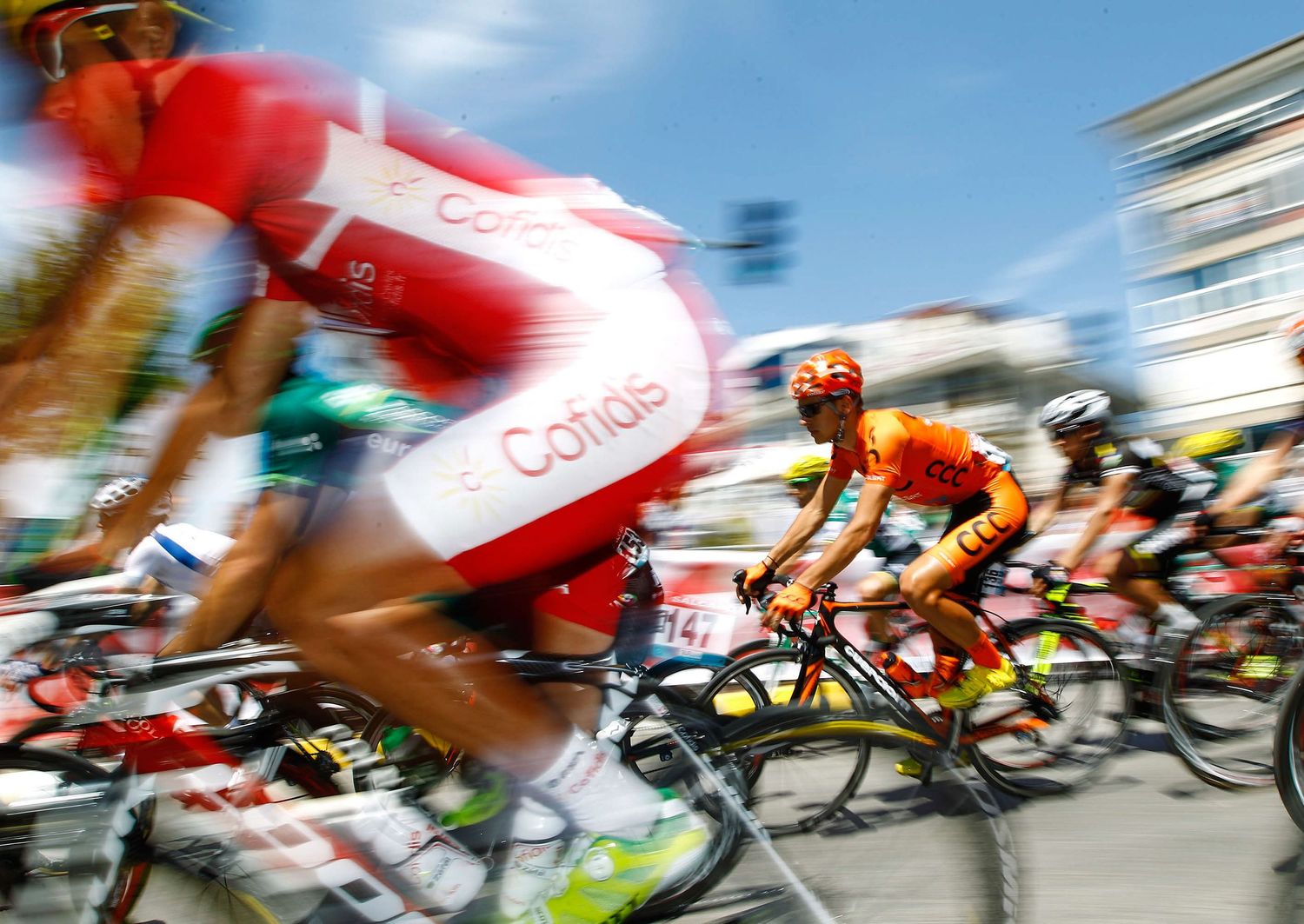 Group of cyclists sprinting toward the finish line – sports photographer NYC