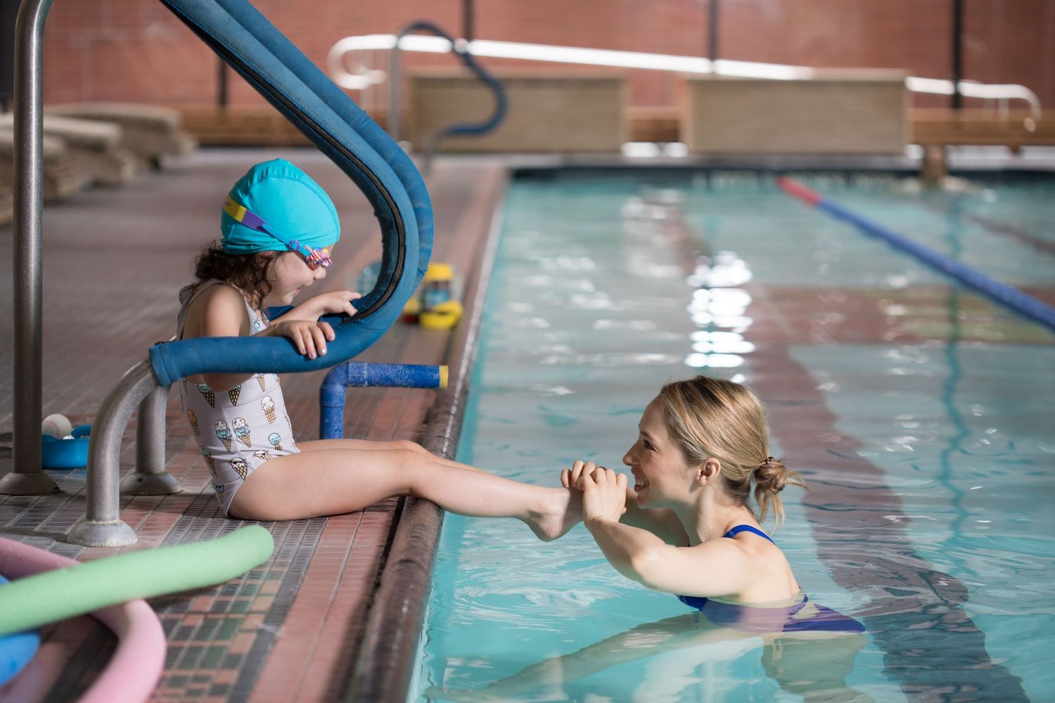Branding photography for a swimming coach in NYC, Jersey City, and Hoboken, capturing professional portraits for marketing and online presen