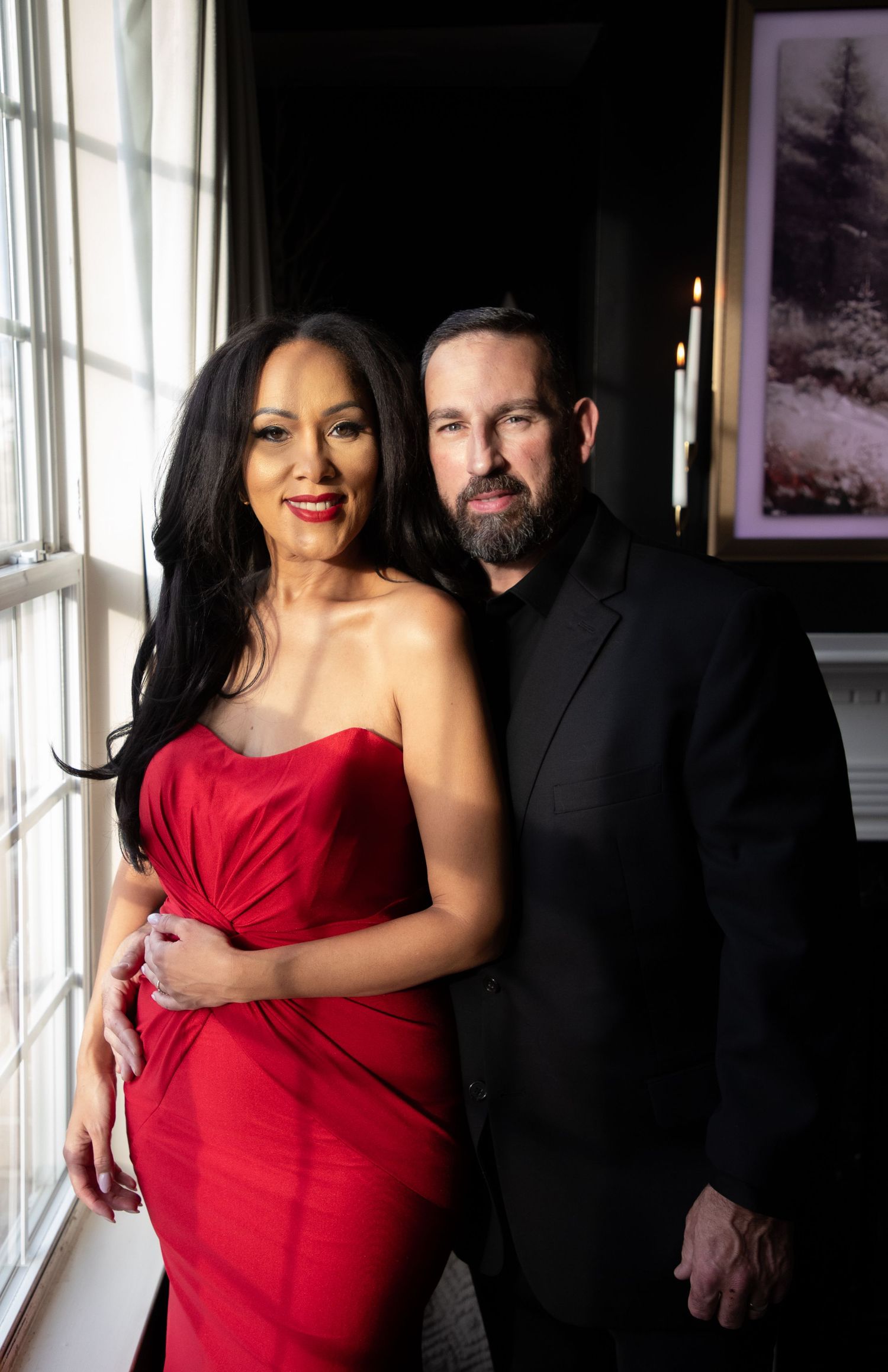 Romantic and elegant couple photoshoot at home in Hoboken, captured in soft natural light.