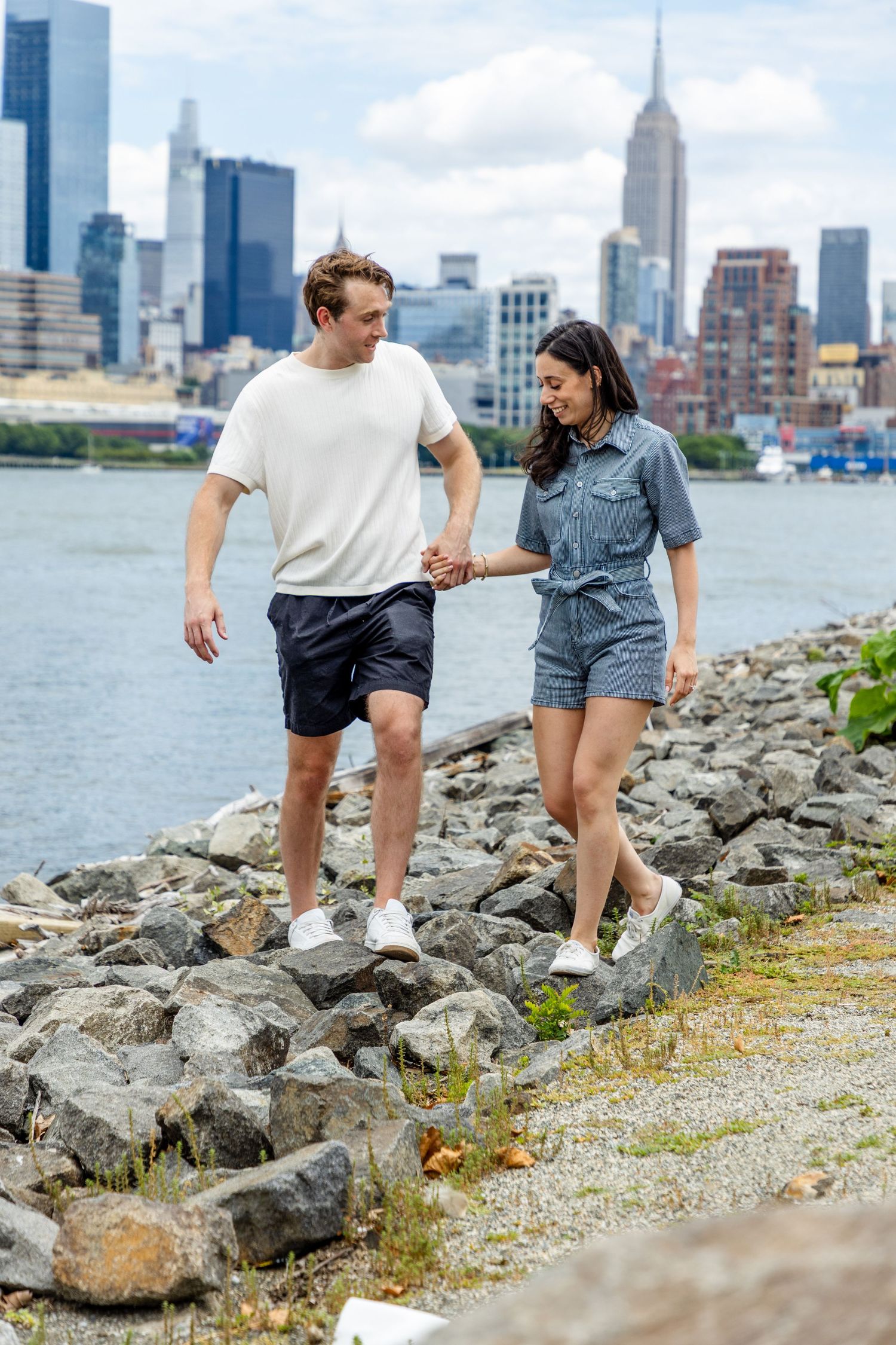 A surprise marriage proposal in Hoboken captured by a local proposal photographer with the Manhattan skyline backdrop.