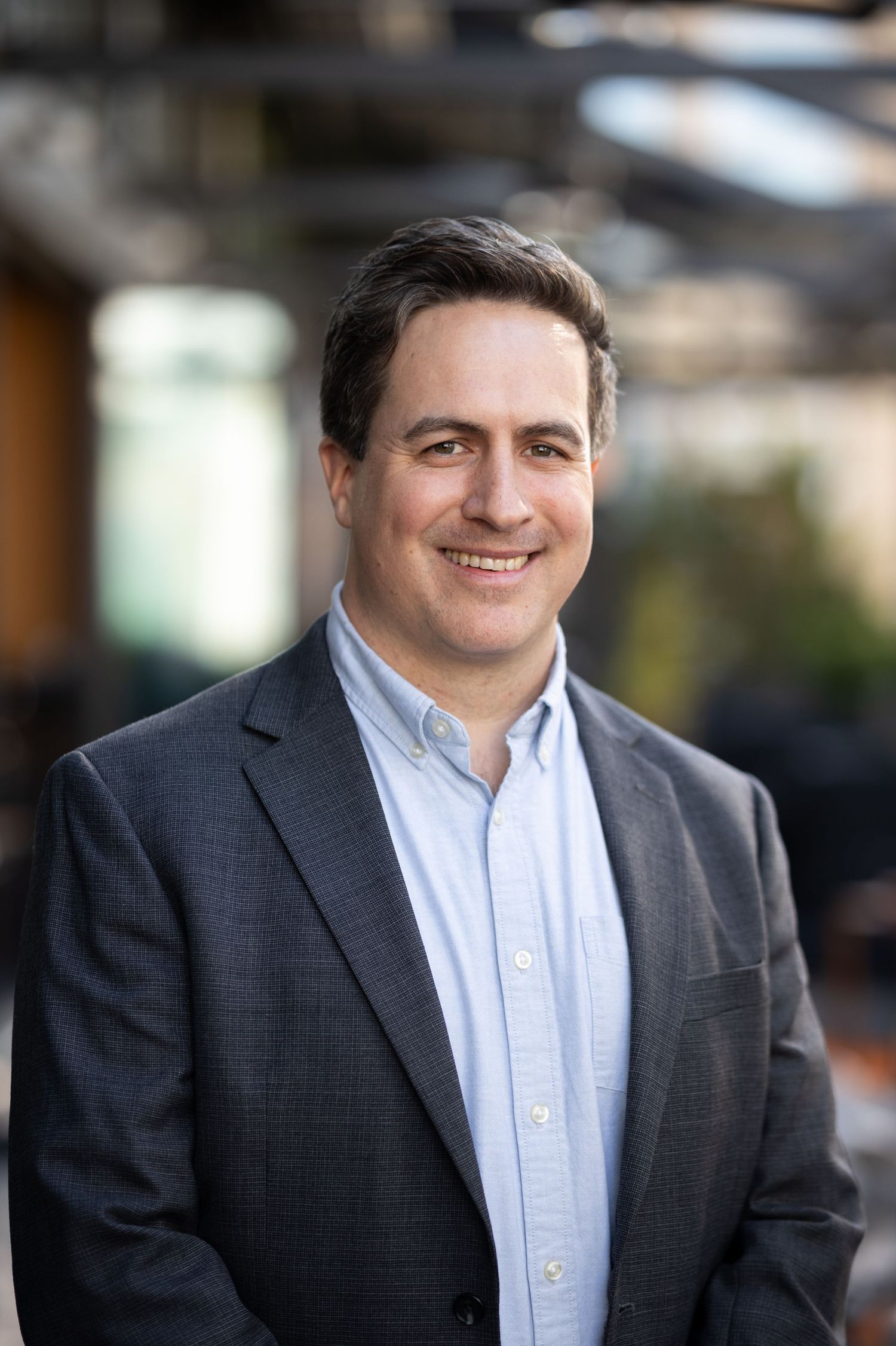 Business professional posing for a clean, natural headshot session – NYC & Jersey City.