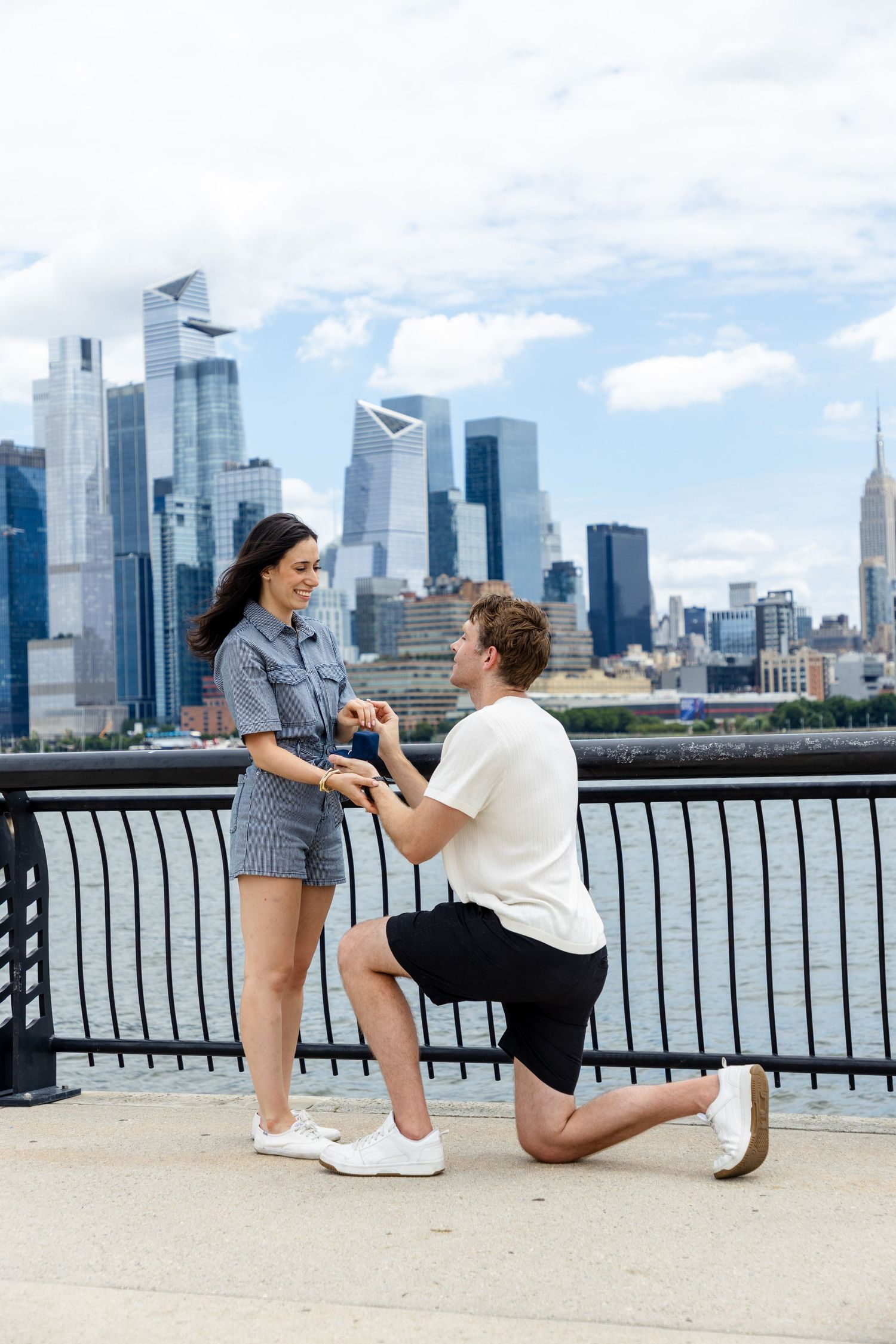 Surprise marriage proposal photography in Jersey City and NYC - Candid engagement photographer capturing romantic moments in Hoboken