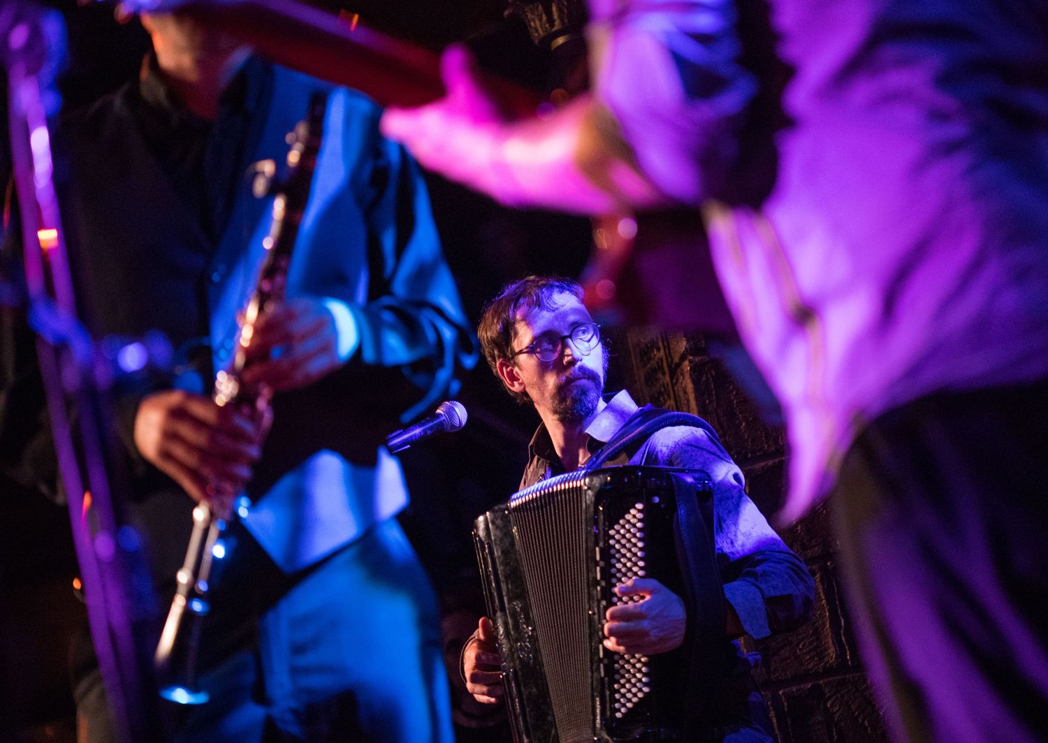 Barcelona Gipsy Klezmer Orchestra performing live in New York City — vibrant concert photo capturing multicultural music fusion.