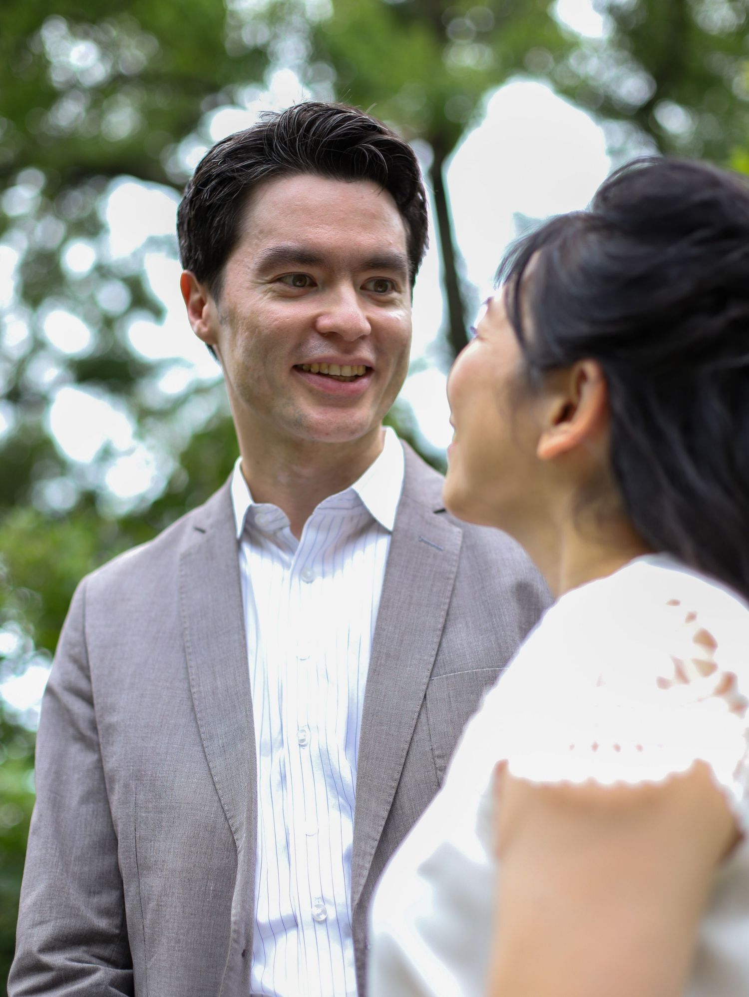 Small wedding ceremony captured in natural light at Battery Park, New York City.