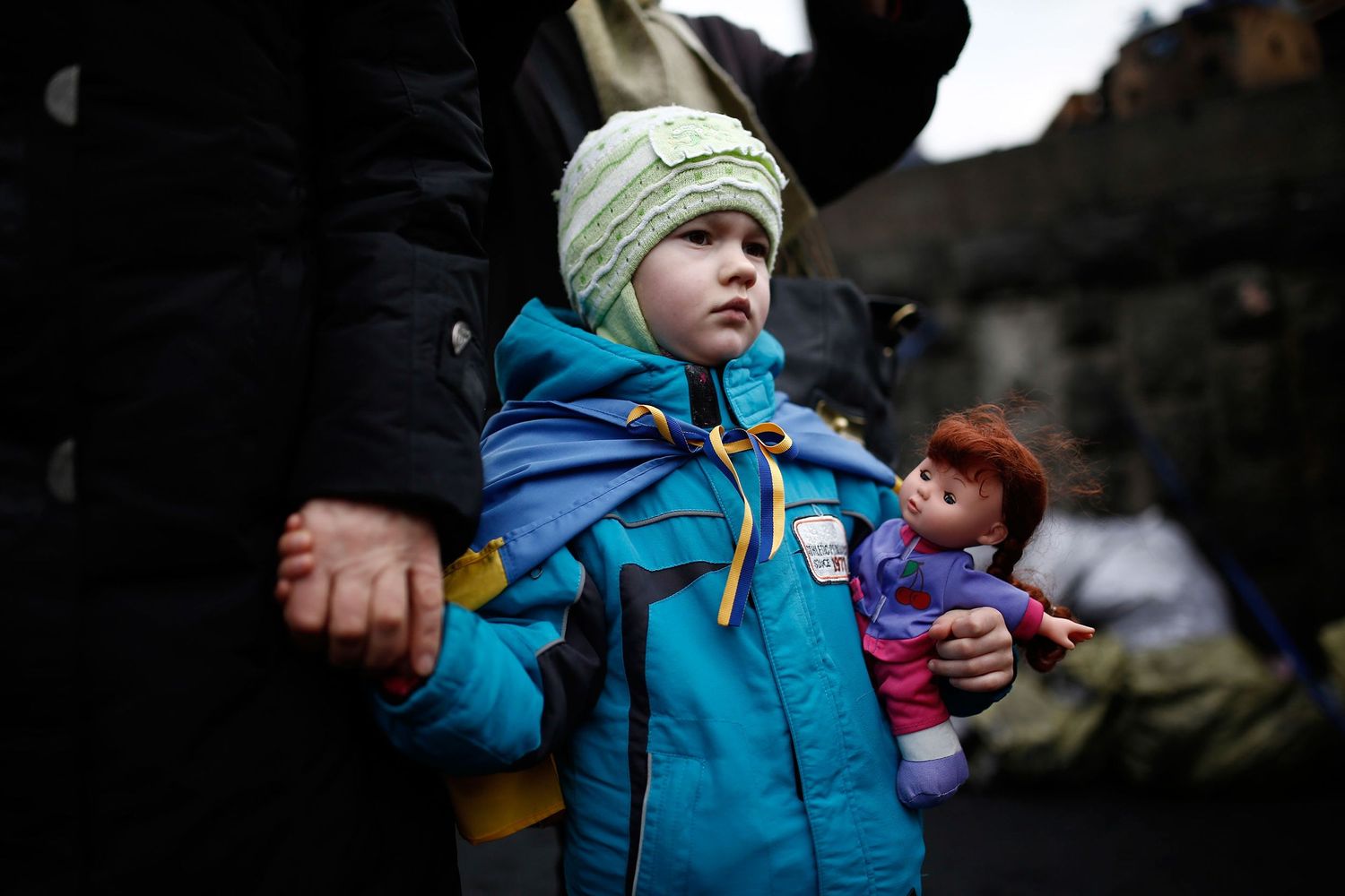 Ukrainian girl attending a memorial ceremony for the victims of the Maidan protests — emotional photojournalism from Kyiv.
