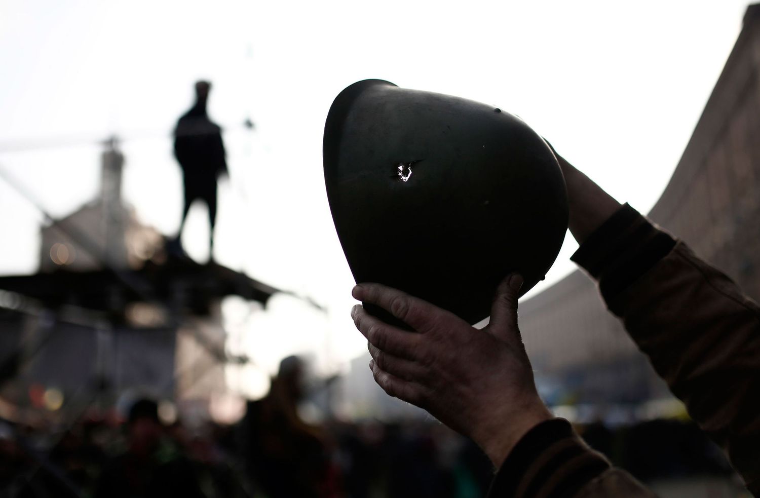 Memorial ceremony in Kyiv honoring victims of the Maidan protests — documentary photo capturing collective mourning and remembrance.