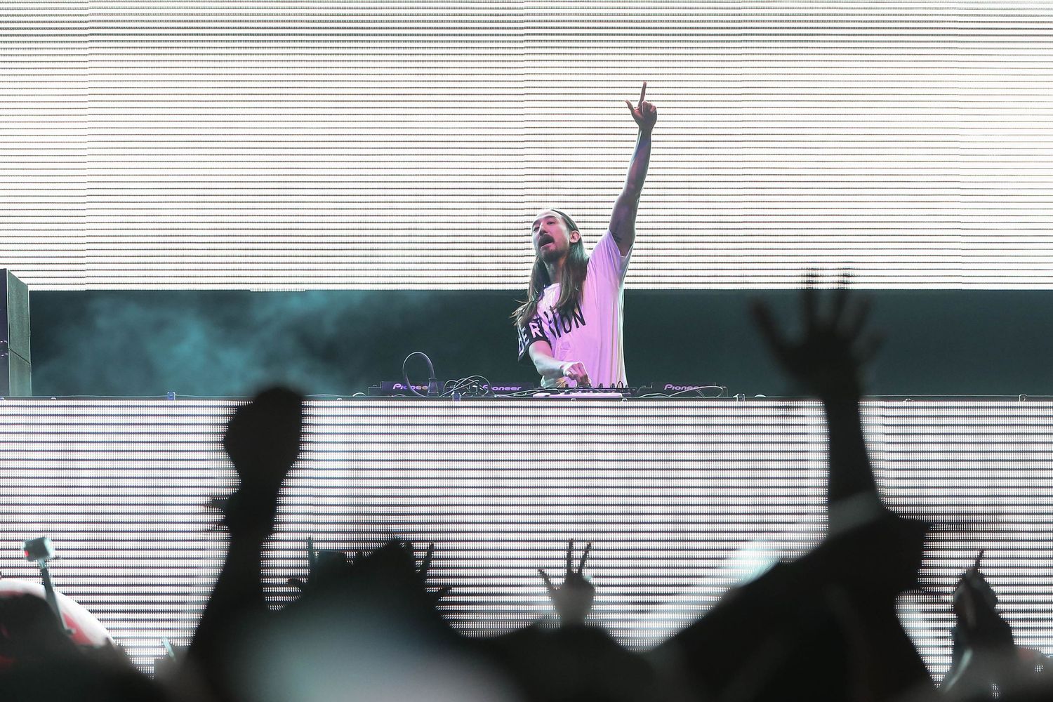 Steve Aoki performing live in New York City — high-energy EDM concert photography capturing lights, movement, and crowd interaction.