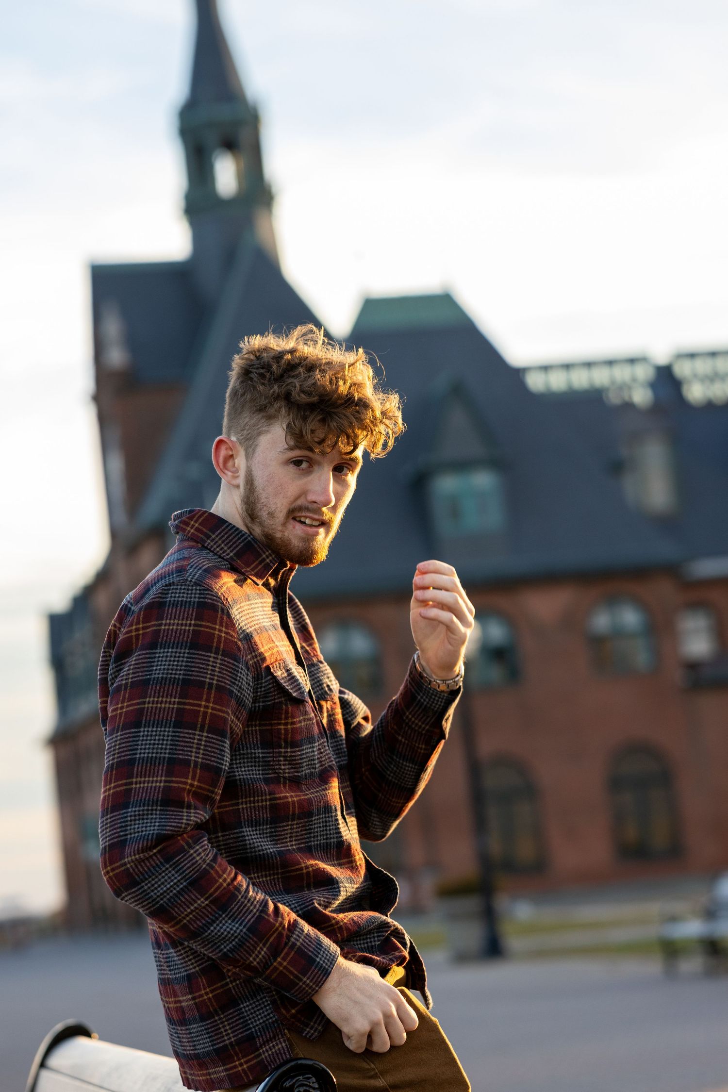High school senior portrait at Liberty State Park — natural light graduation photo with views of the NYC skyline.