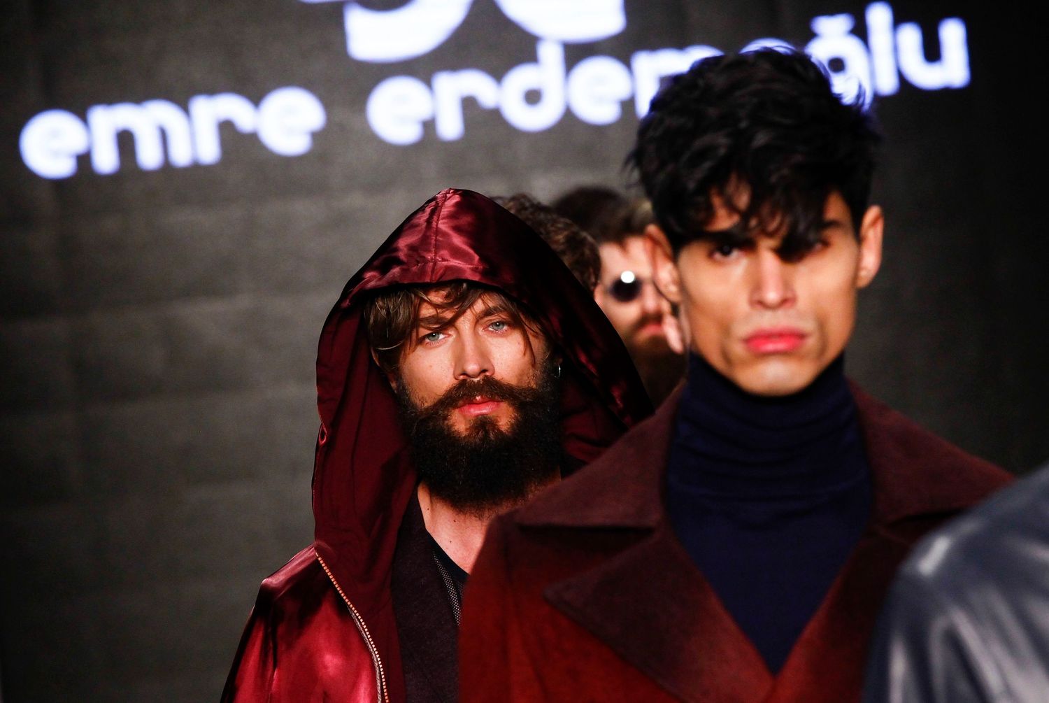 Fashion model walking the runway during NYC Fashion Week — captured mid-stride with confidence and style.