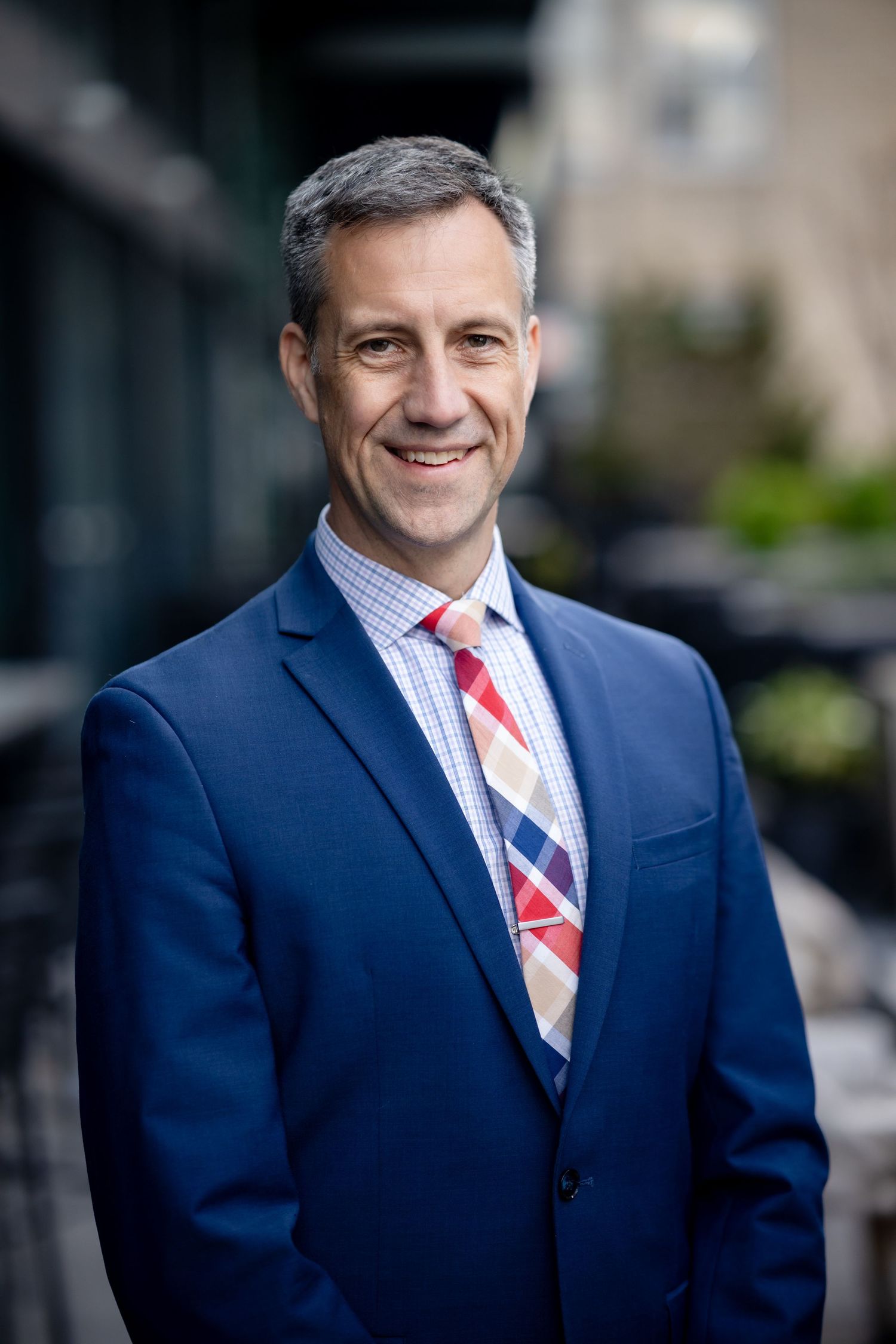 Business professional posing for a clean, natural headshot session – NYC & Jersey City.