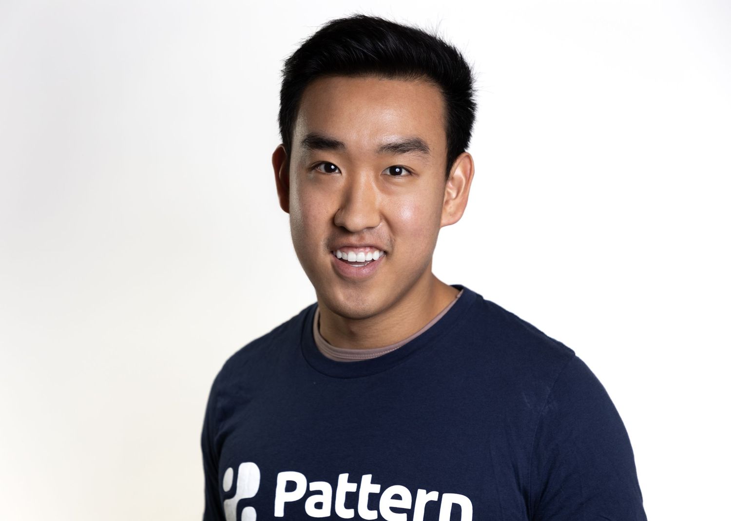 Business professional posing for a clean, natural headshot session – NYC & Jersey City.