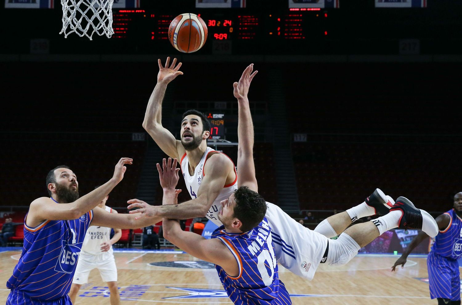 Action photo from a professional basketball game — fast-paced sports moment captured with documentary style.