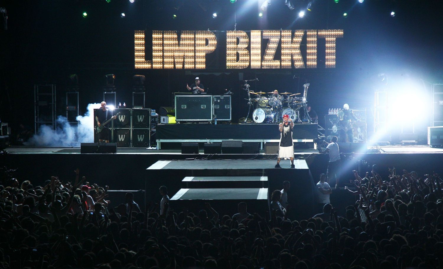 Limp Bizkit performing live on stage in New York City — intense concert photography capturing the raw energy of nu-metal.