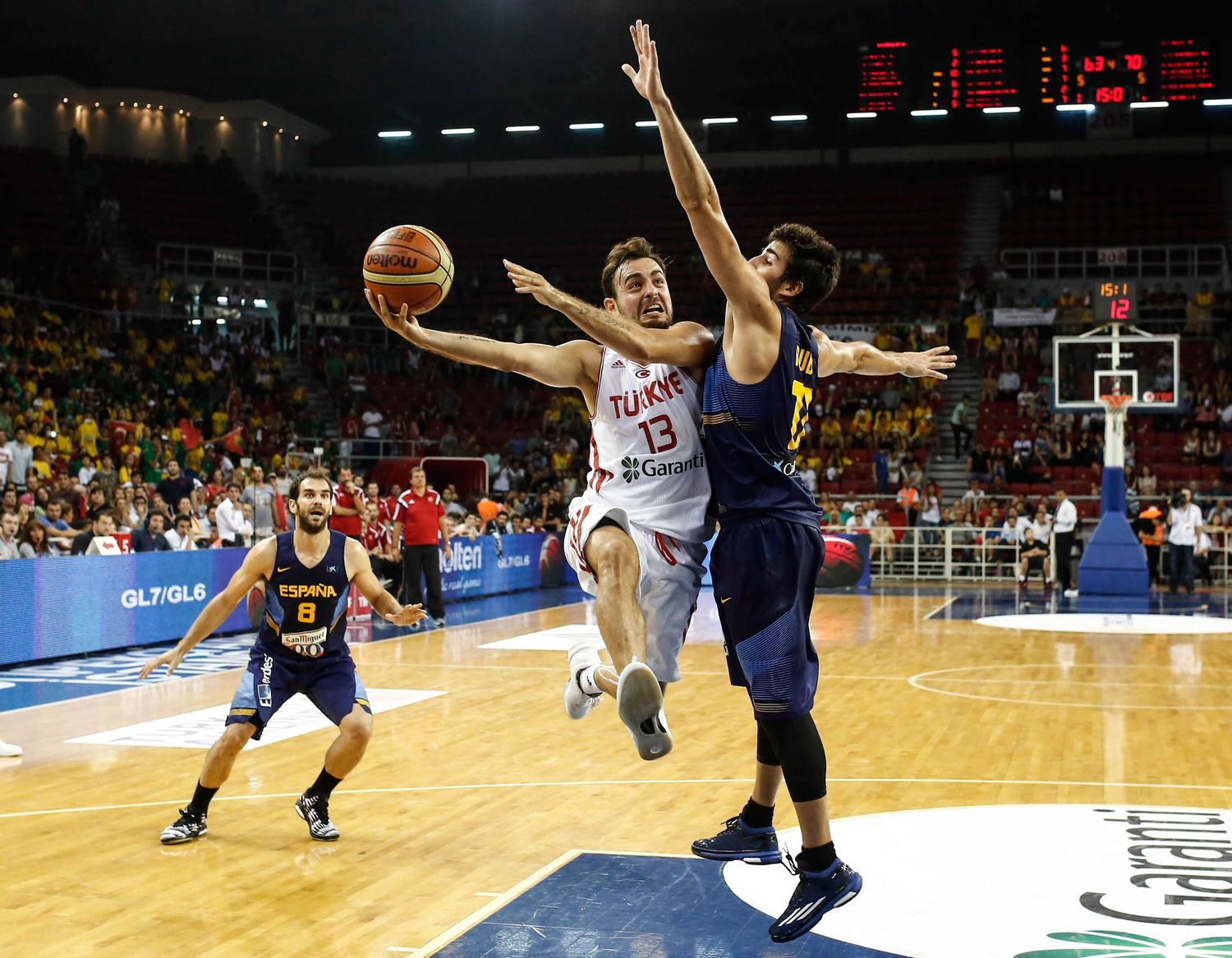 Action photo from a professional basketball game — fast-paced sports moment captured with documentary style.