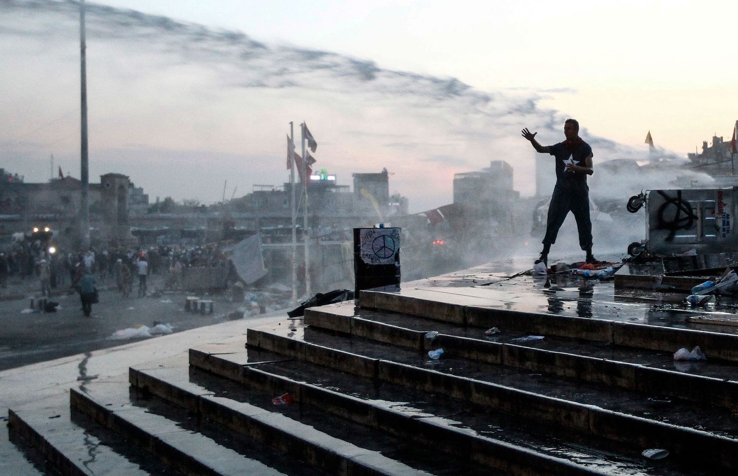 Protesters confronting police during the Gezi Park demonstrations in Istanbul — documentary photo capturing civil resistance.