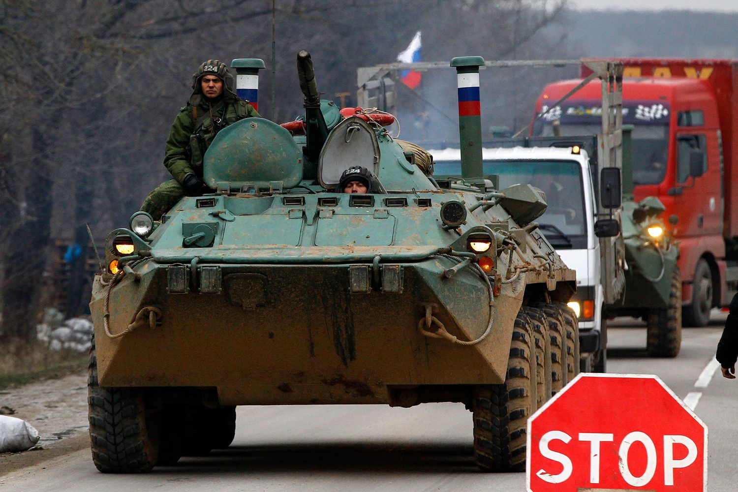 Russian tank crossing into Ukrainian territory — documentary photo marking the onset of military invasion.