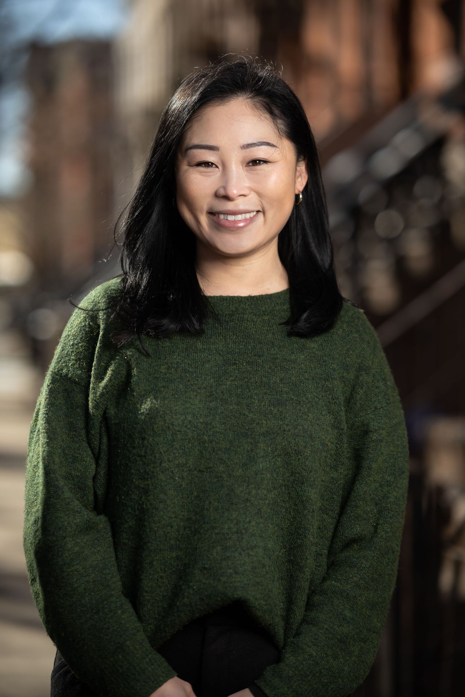 Business professional posing for a clean, natural headshot session – NYC & Jersey City