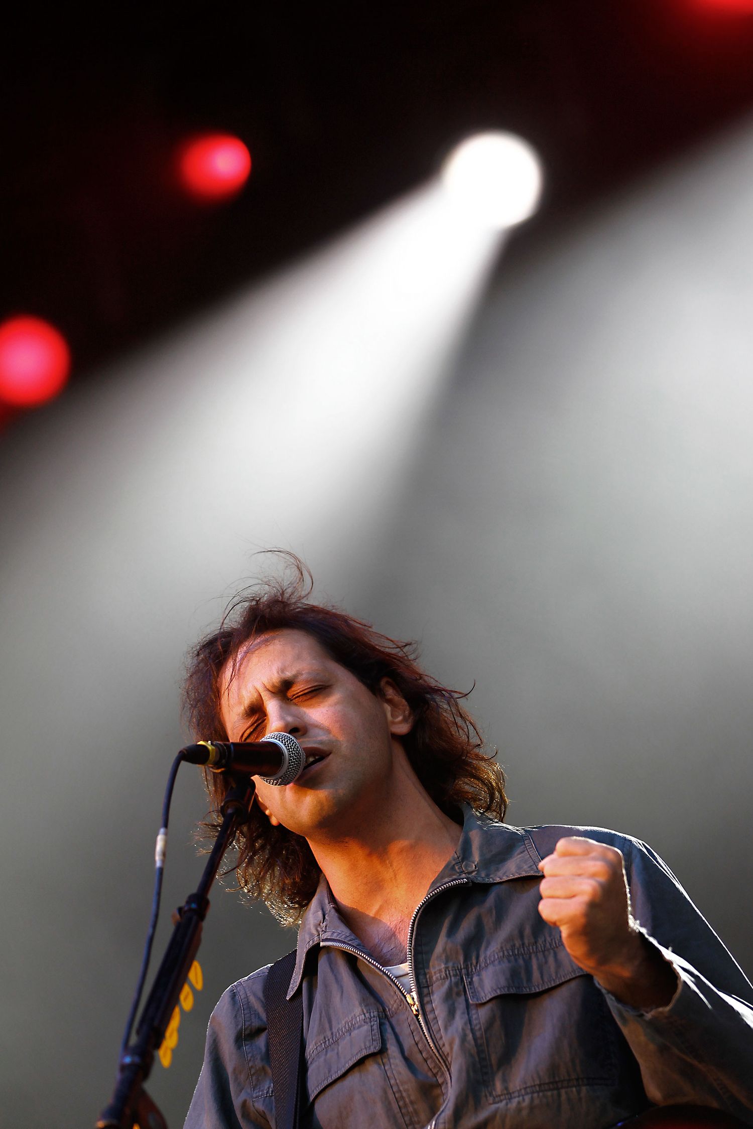Duman performing live on stage in Istanbul — powerful concert photo capturing the energy of Turkish rock music.