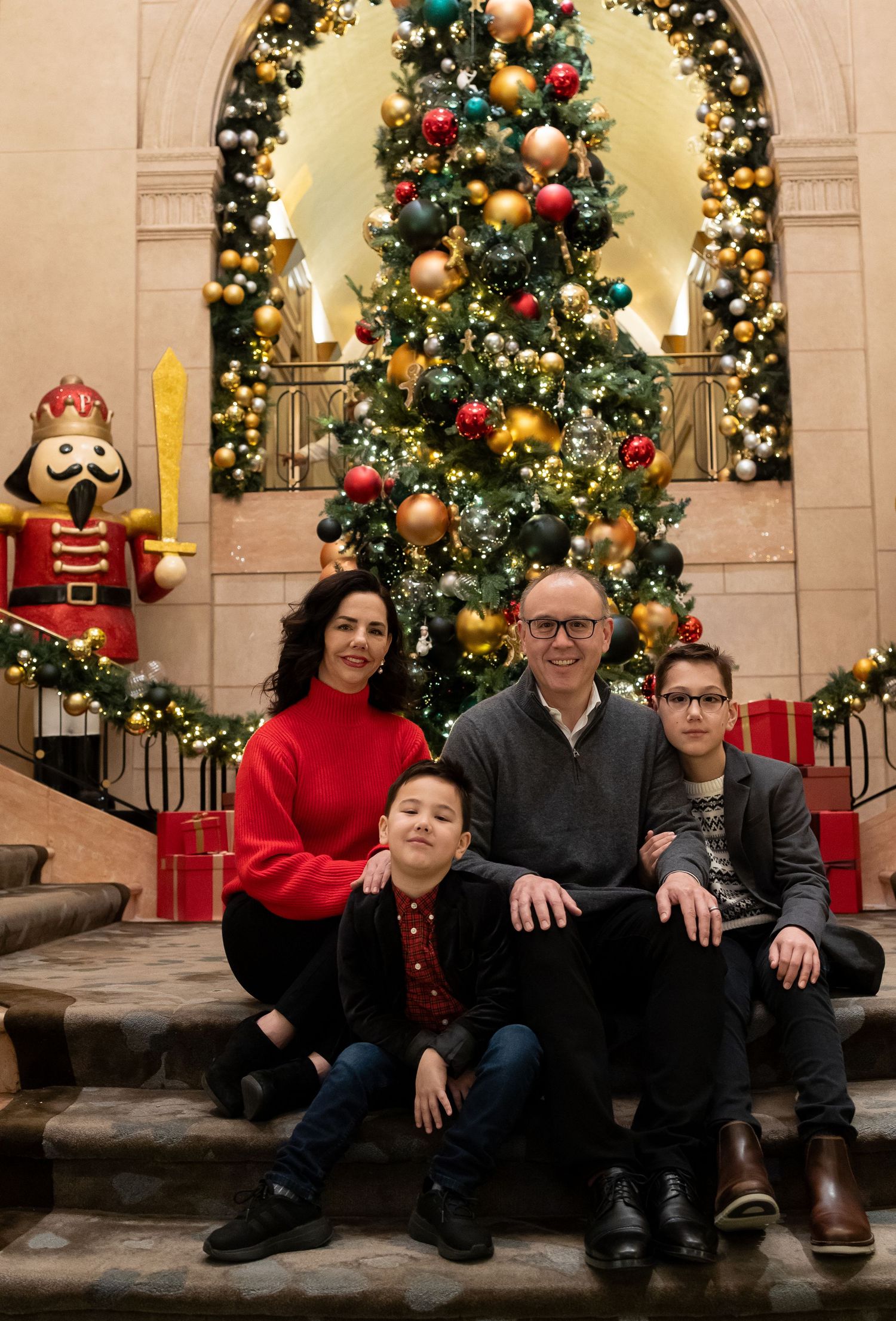 Elegant family portrait in New York City — classy and timeless look with urban sophistication.