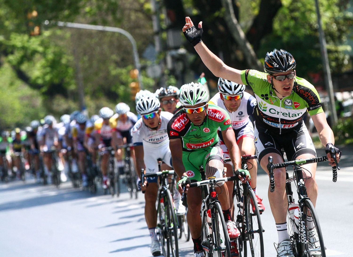 Group of cyclists sprinting toward the finish line – sports photographer NYC