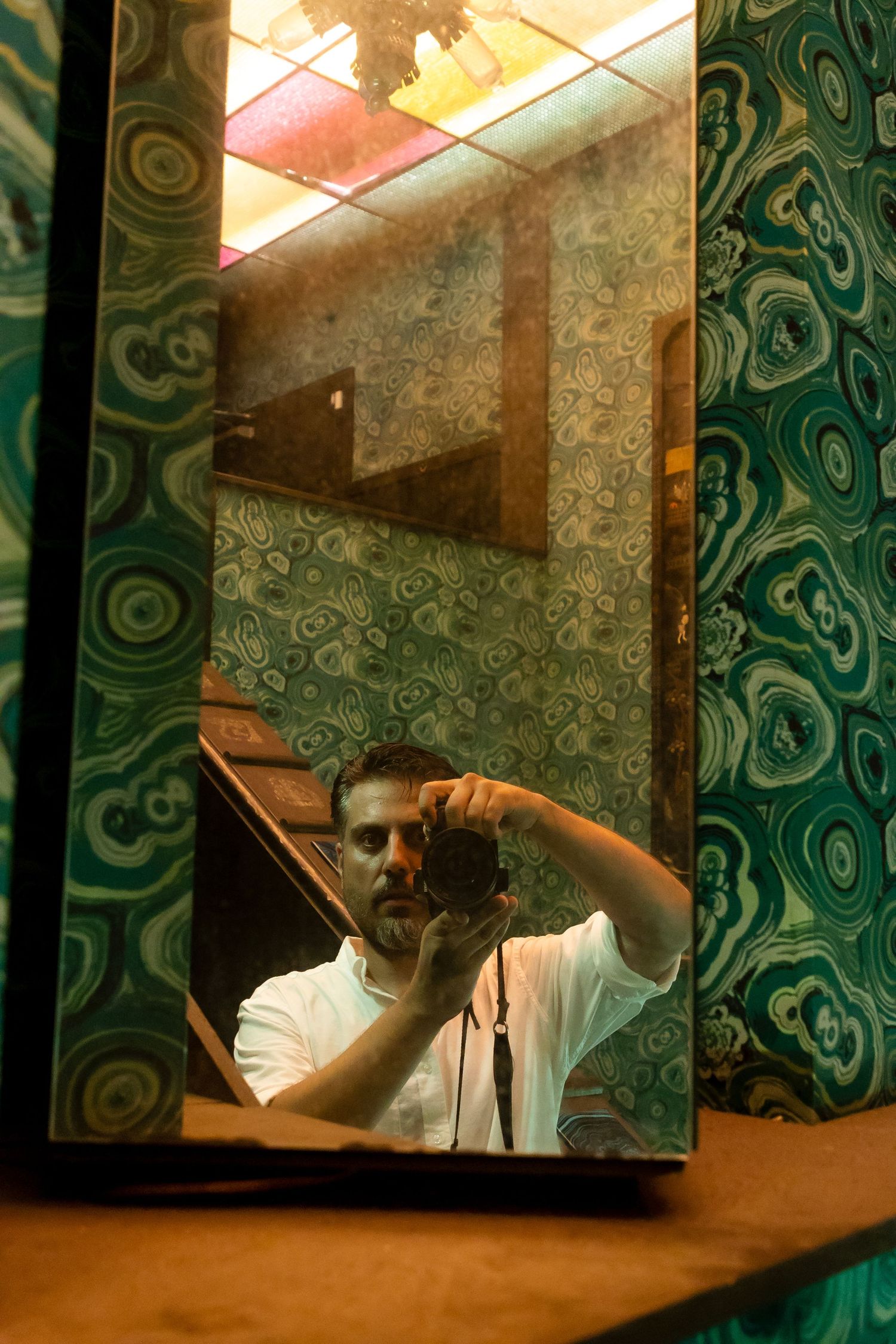 NYC Photographer Ben Bulent Doruk taking his picture from the mirror.