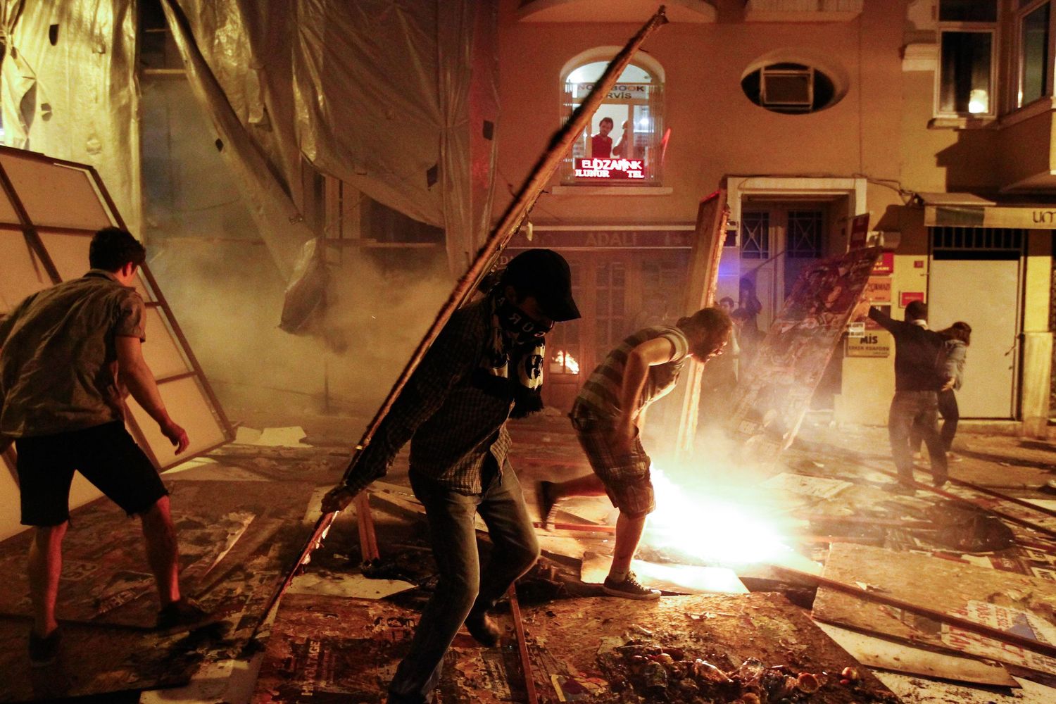 Protesters confronting police during the Gezi Park demonstrations in Istanbul — documentary photo capturing civil resistance.