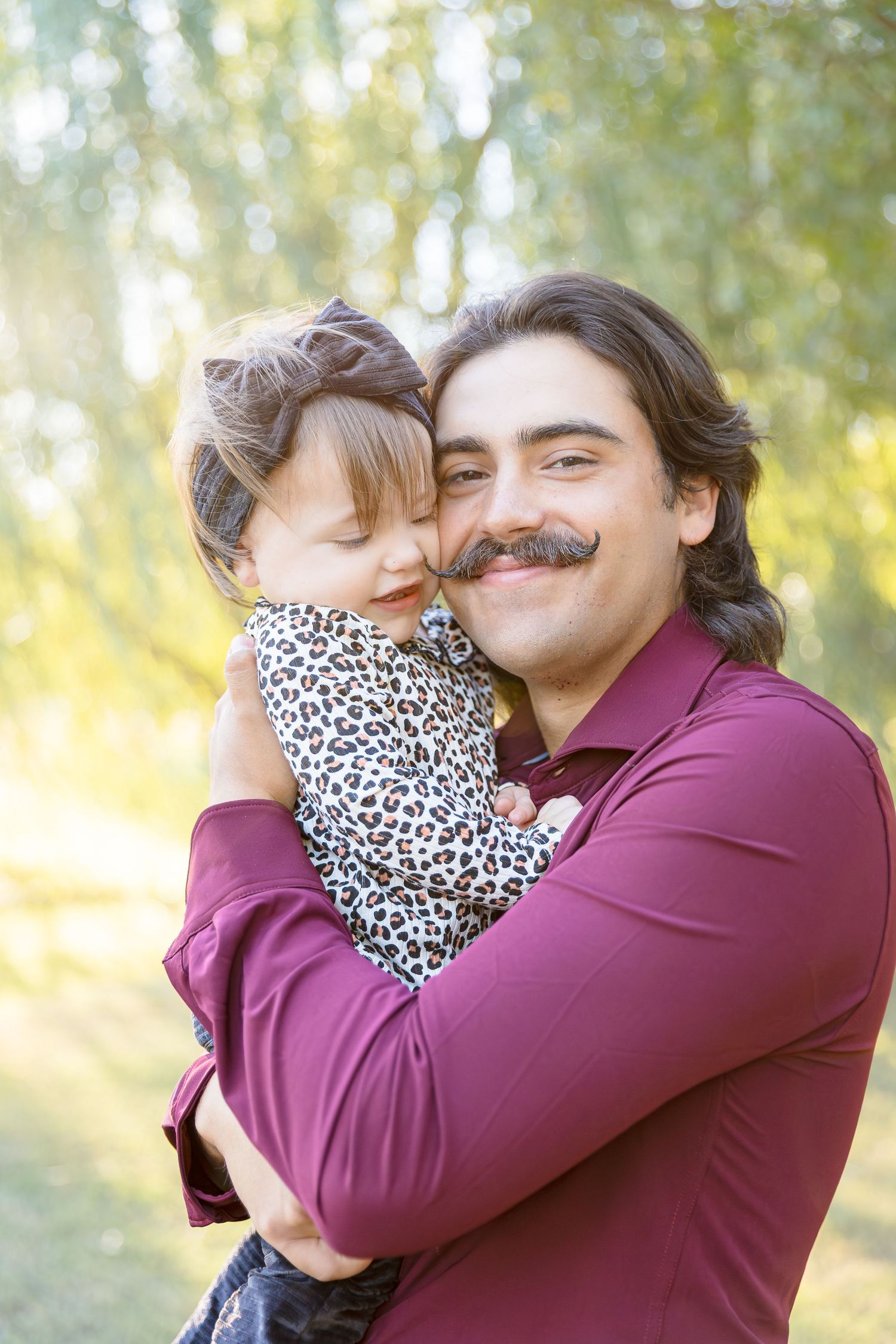 Heartwarming family photos showing embraces and smiles in a sunny outdoor setting.