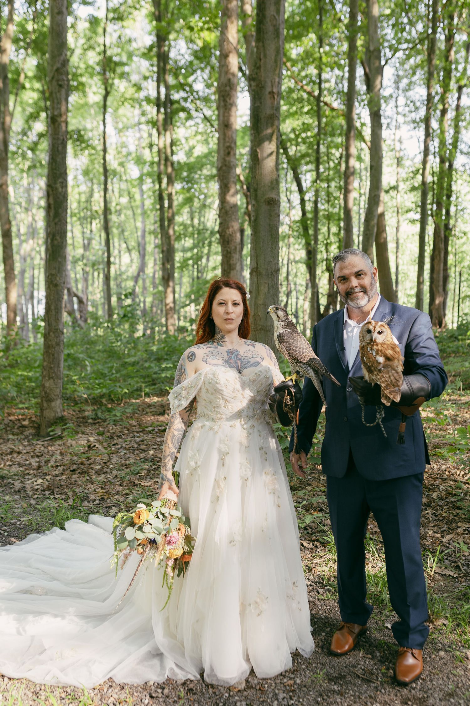 Elegant wedding photos captured in a serene forest setting with natural lighting.