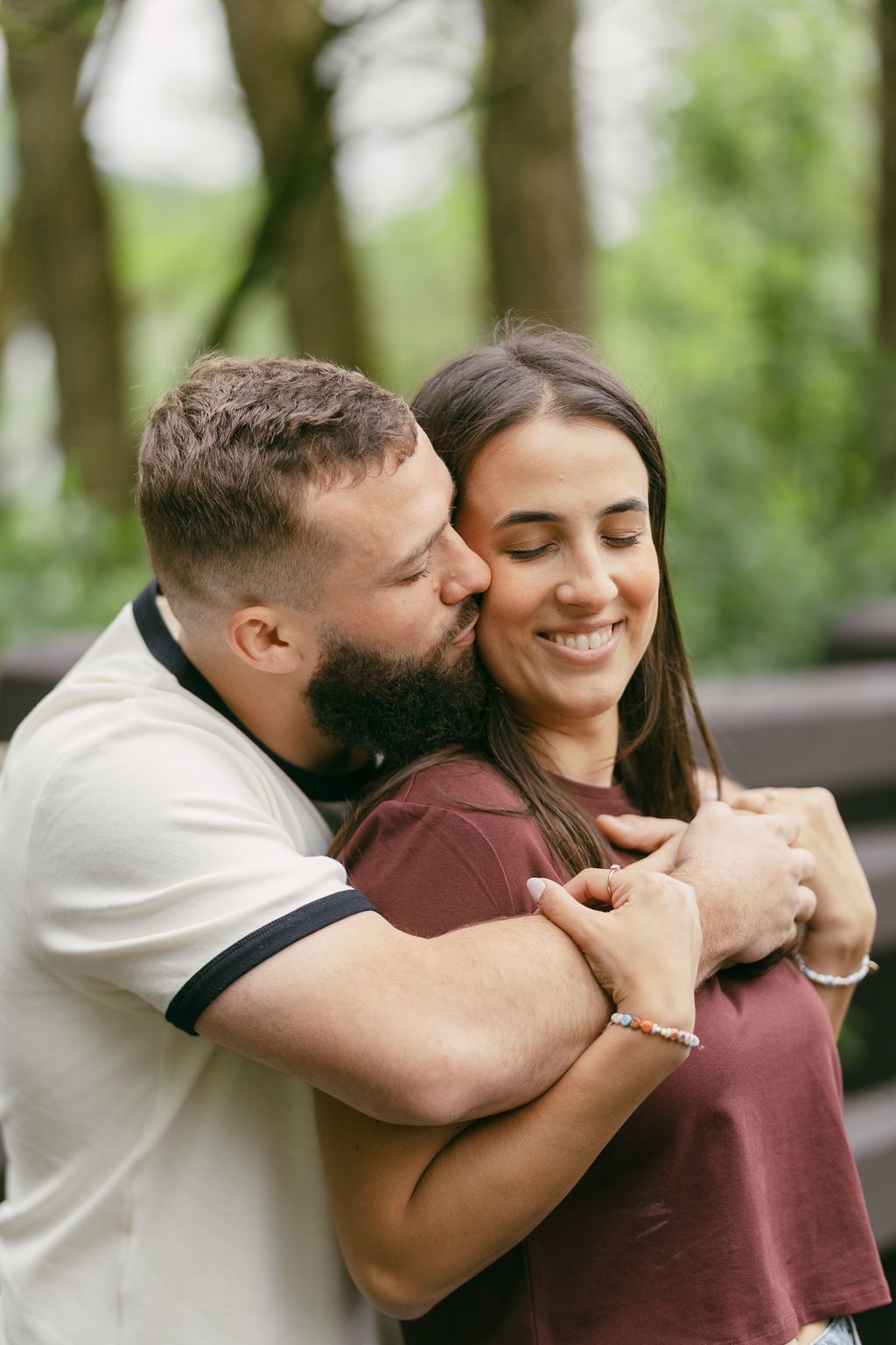 Romantic couple embracing outdoors in a series of candid shots.