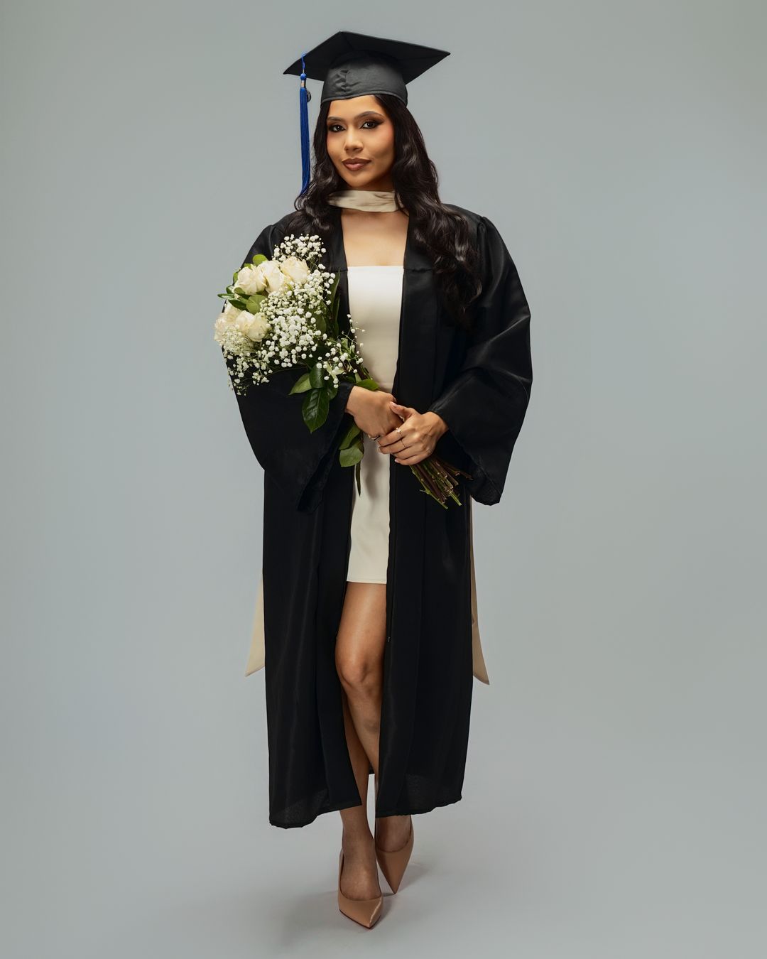 Graduation photo session in-studio with creative posing and soft lighting by Tampa Photographer Rashad Gilmore