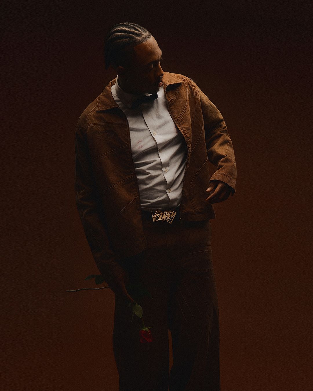 Portrait photo in-studio with creative posing and soft lighting by Tampa Photographer Rashad Gilmore