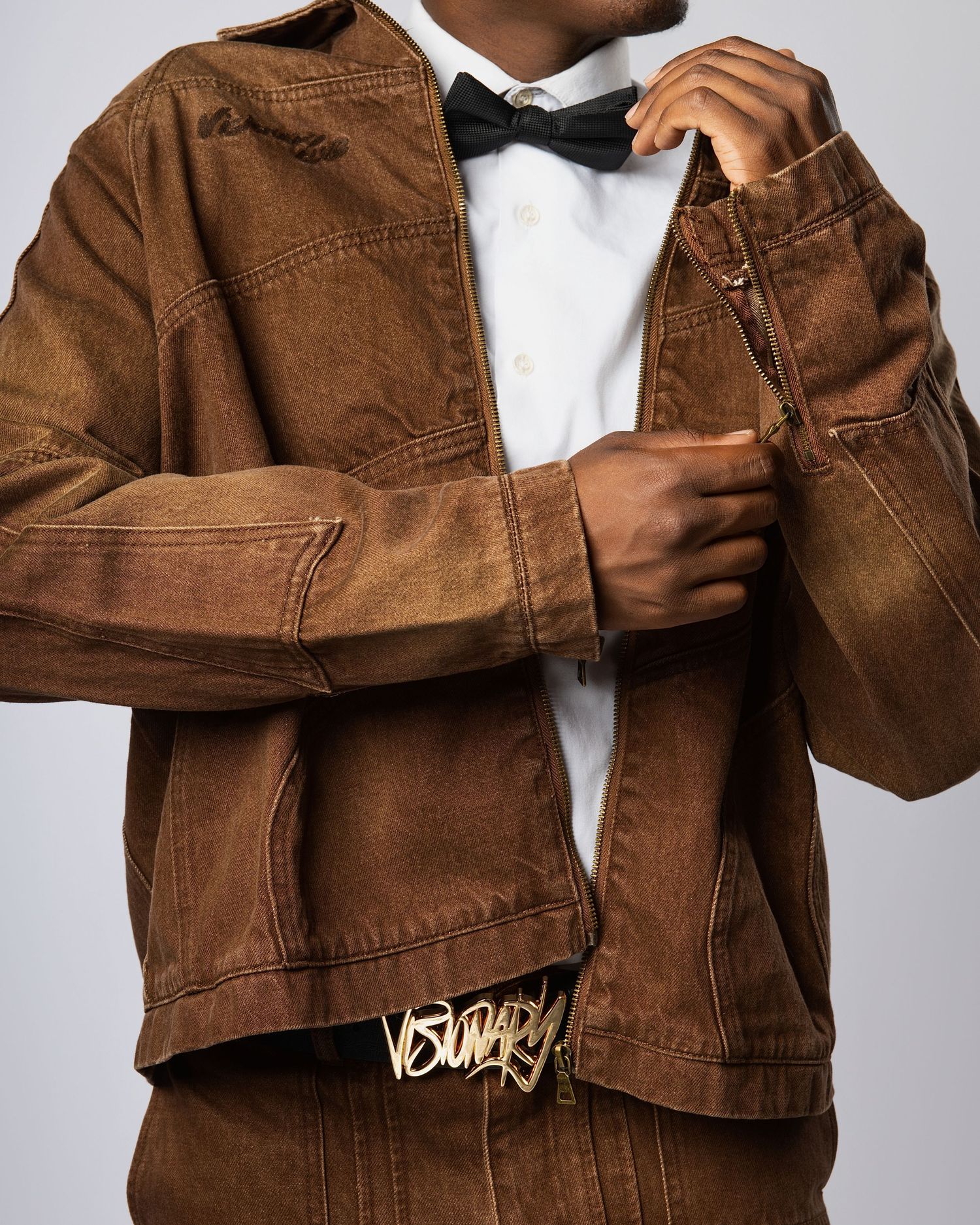 Person wearing a brown corduroy jacket shown from different angles against a light background.
