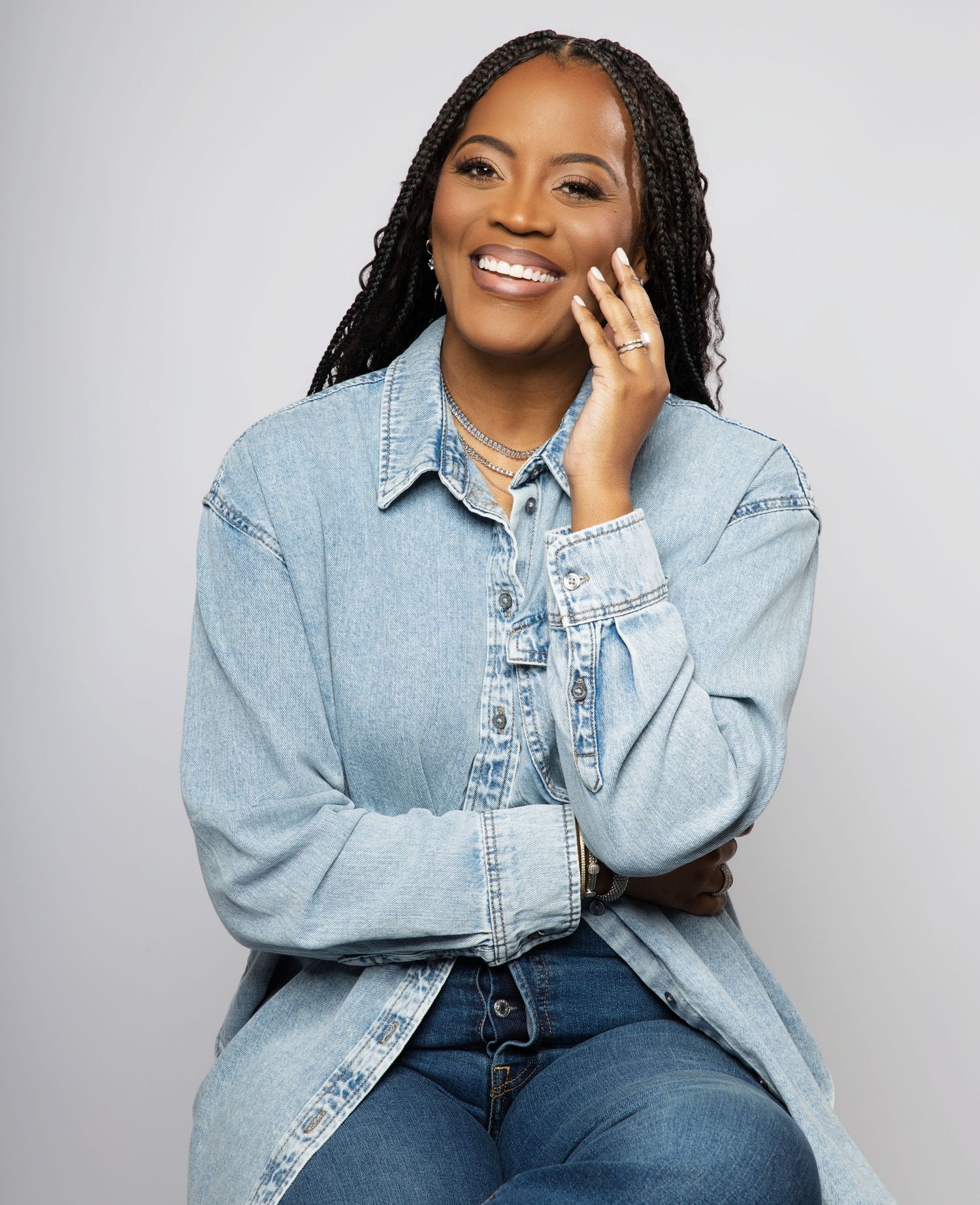 A series of casual poses featuring someone in a light denim jacket against a white studio background.