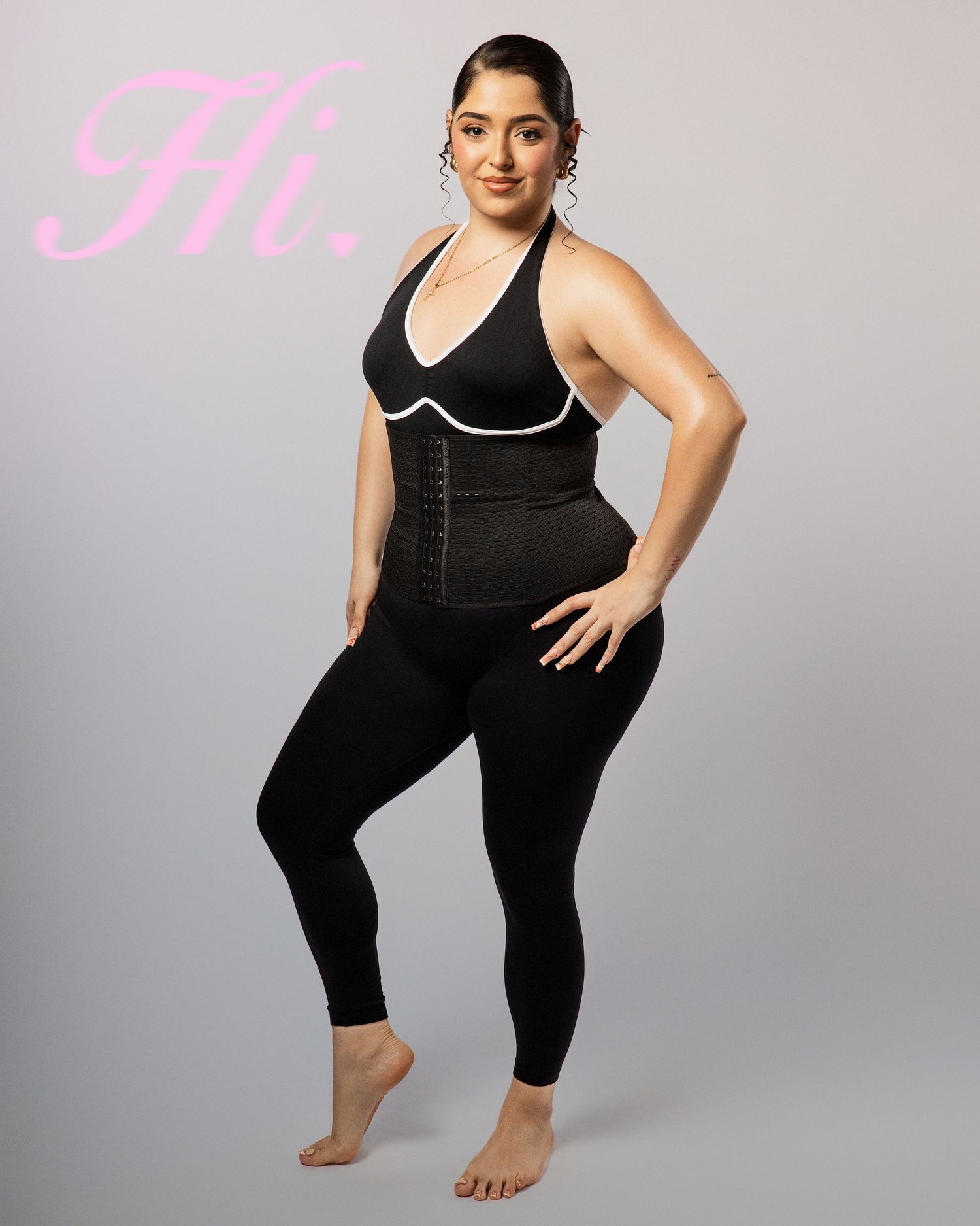 Athletic model demonstrates various poses in black compression wear against light background.