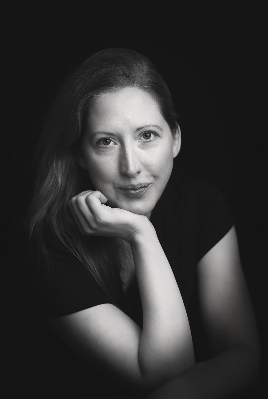 Artistic black and white portrait series showing contemplative expressions in dramatic lighting.