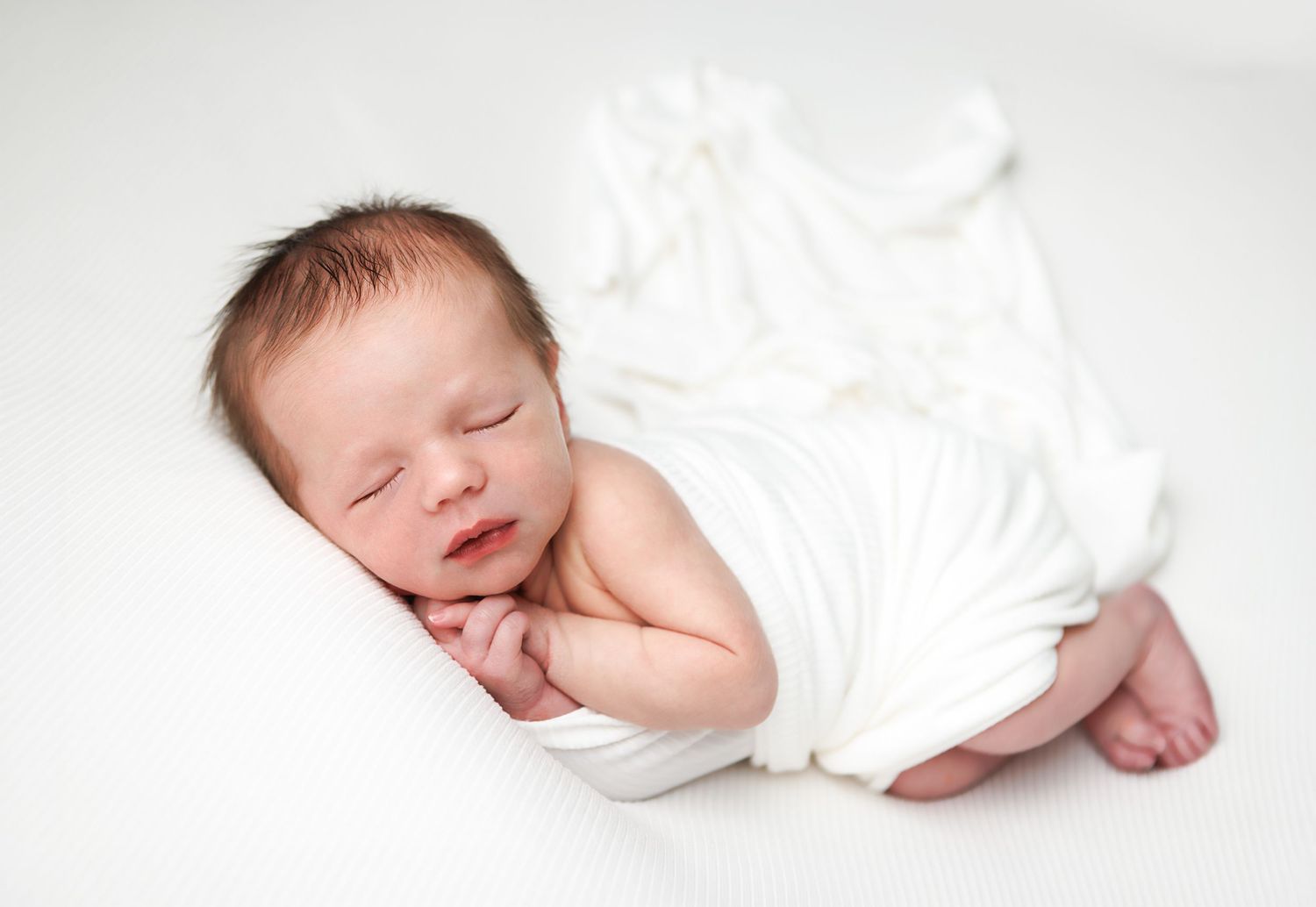 Professional newborn photography portrait created during a fully guided baby session in Salem, NH